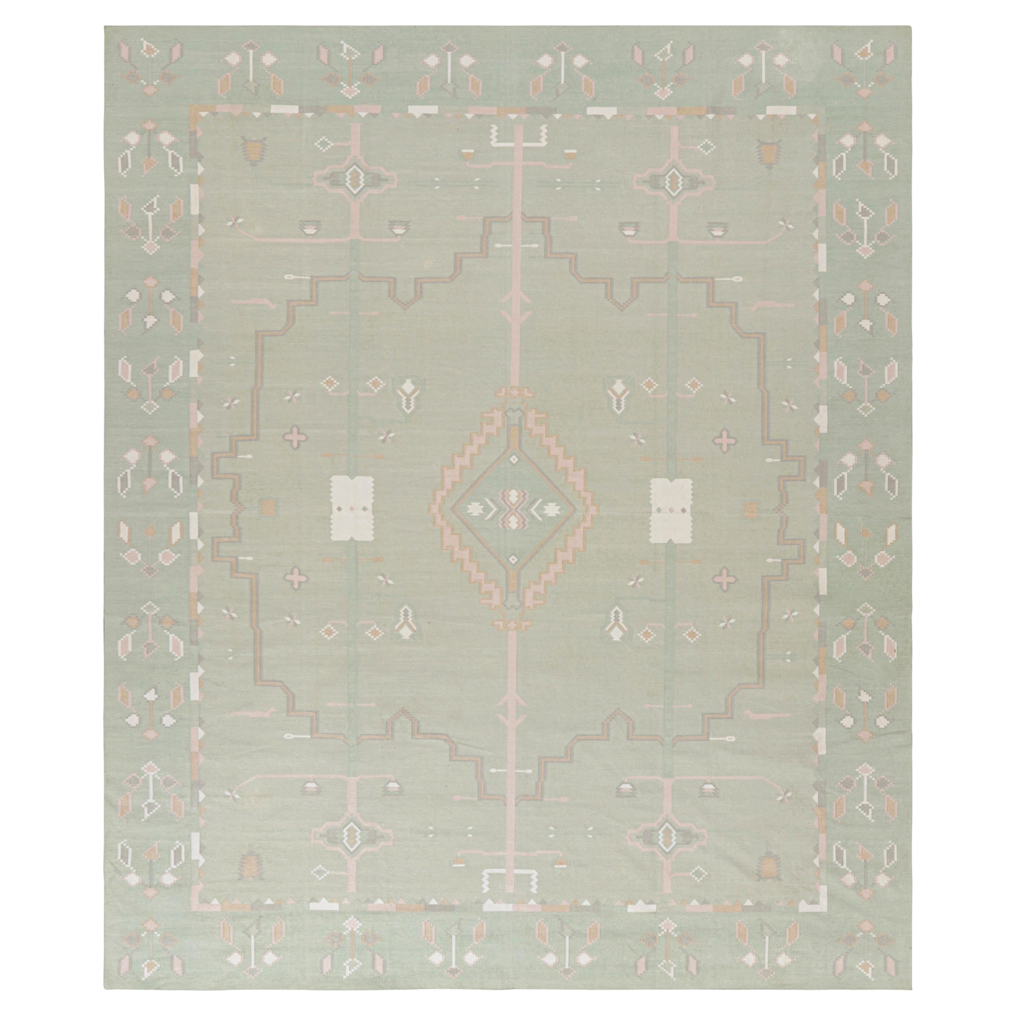 Alfombra contemporánea Dhurrie de Rug & Kilim en verde brillante con motivos geométricos