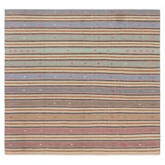 Rug & Kilim’s Contemporary Dhurrie Rug in Brown and Colorful Stripes
