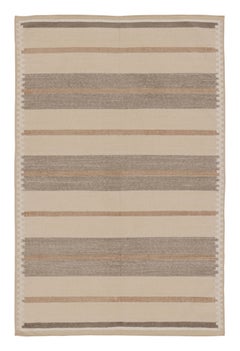Rug & Kilim’s Contemporary Dhurrie Rug in Brown Geometric Stripes