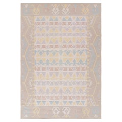 Rug & Kilim’s Contemporary Dhurrie Rug in Pastels and Geometric Patterns