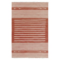 Rug & Kilim’s Contemporary Dhurrie Rug in Rust and White Stripes
