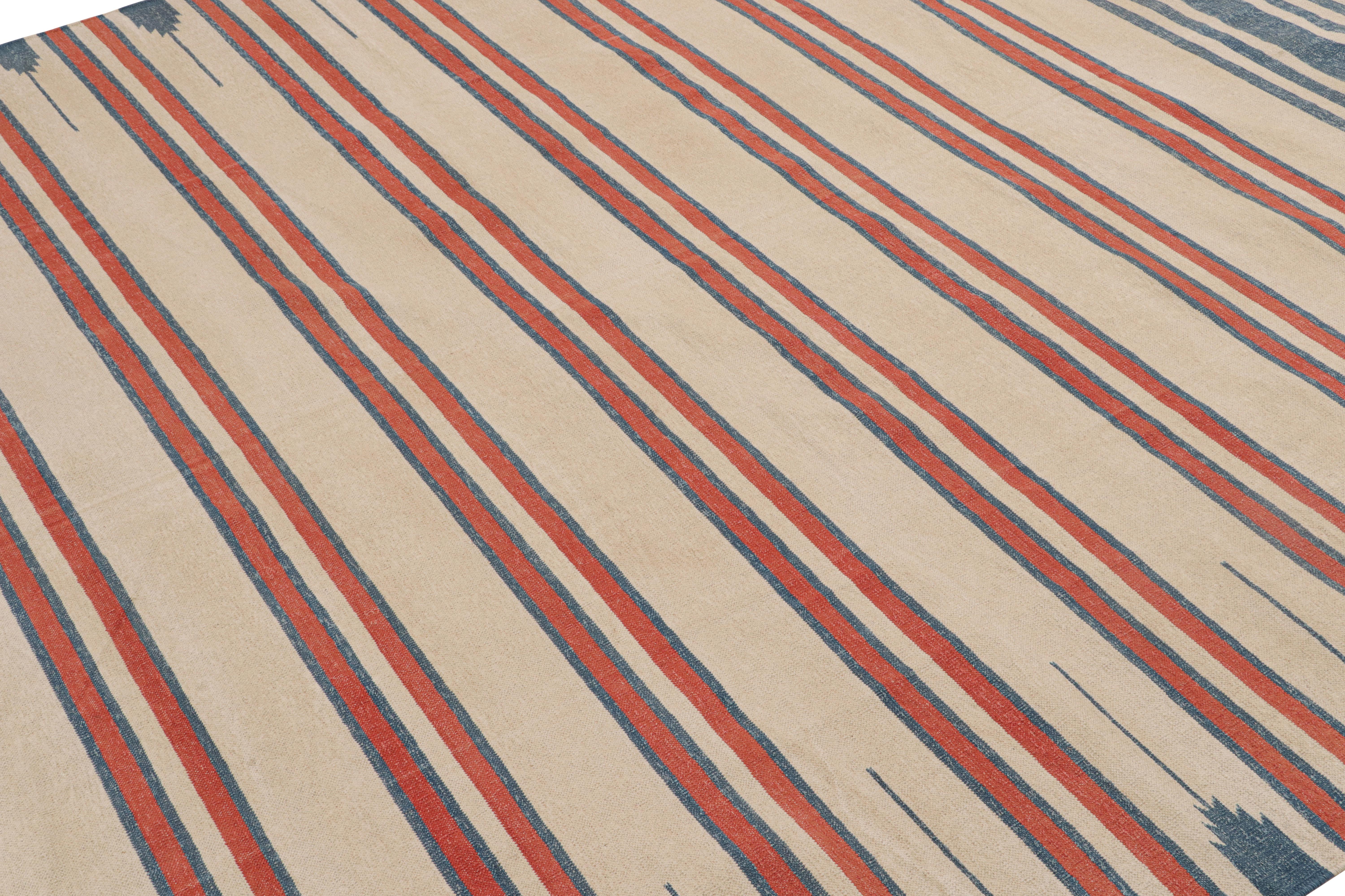 Dieser handgewebte 8x10 Dhurrie-Teppich aus Baumwolle repräsentiert eine aufregende neue Linie moderner Flachgewebe, die wir mit einem der besten Partner-Webstühle in Indien herstellen.

Über das Design:

Beige-, Rot- und Blautöne unterstreichen