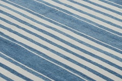 Rug & Kilim’s Contemporary Dhurrie Rug with Blue and off-White Geometric Stripes