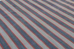 Rug & Kilim’s Contemporary Dhurrie Rug with Blue Stripes and Red Accents