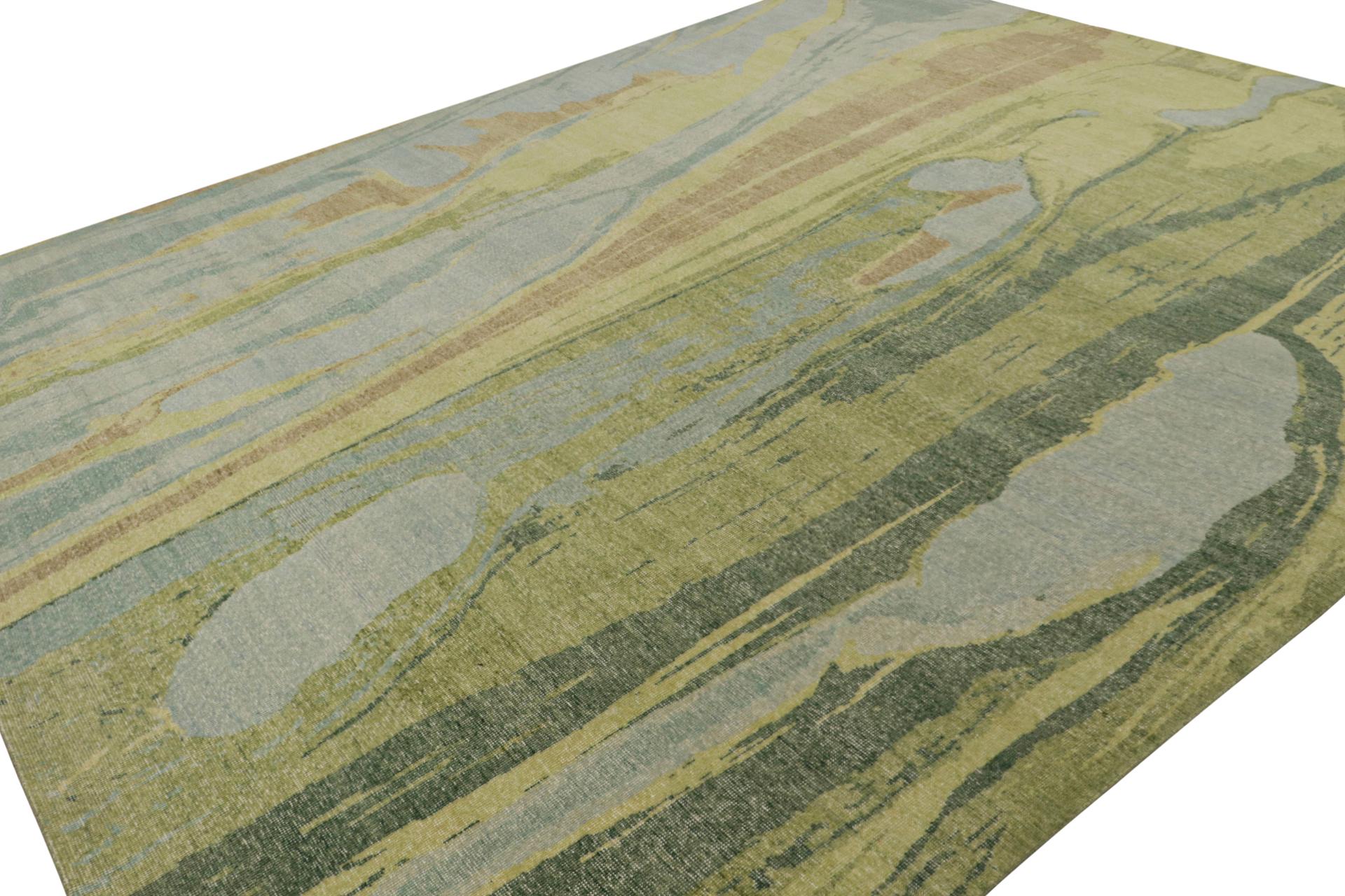 Anudada a mano en lana, esta moderna alfombra de 12x15, originaria de la India, se inspira en temas expresionistas abstractos con aspecto de acuarela, favorece los verdes, los azules y los tonos complementarios intermedios, capaces de iluminar