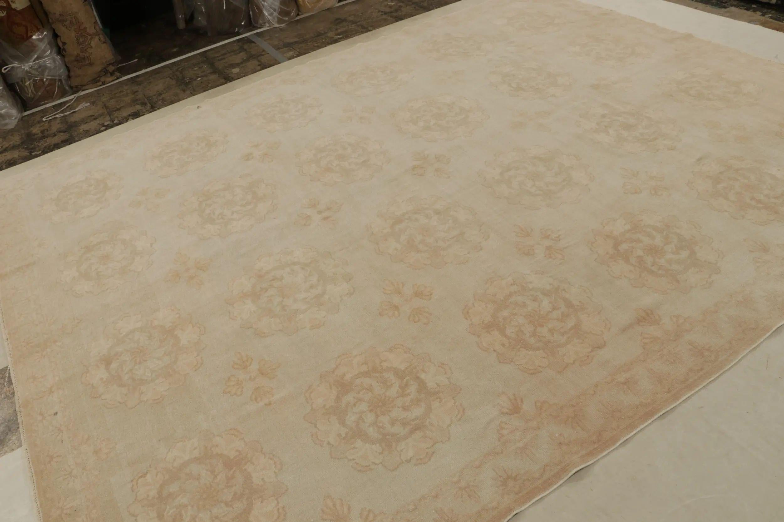 This contemporary 9x11 rug is a new addition to the Rug 
Kilim’s European collection. Inspired by 18th-century Aubusson rugs, this rug has a more subdued take on this regal transitional style with a quiet beauty and subtlety meant to lead the