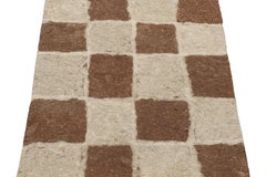 Rug & Kilim’s Contemporary Felted Persian Rug in Beige-Brown Geometric Pattern