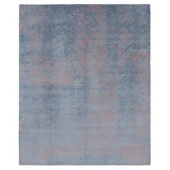 Rug & Kilim è un tappeto geometrico contemporaneo rosa e grigio in lana e seta.