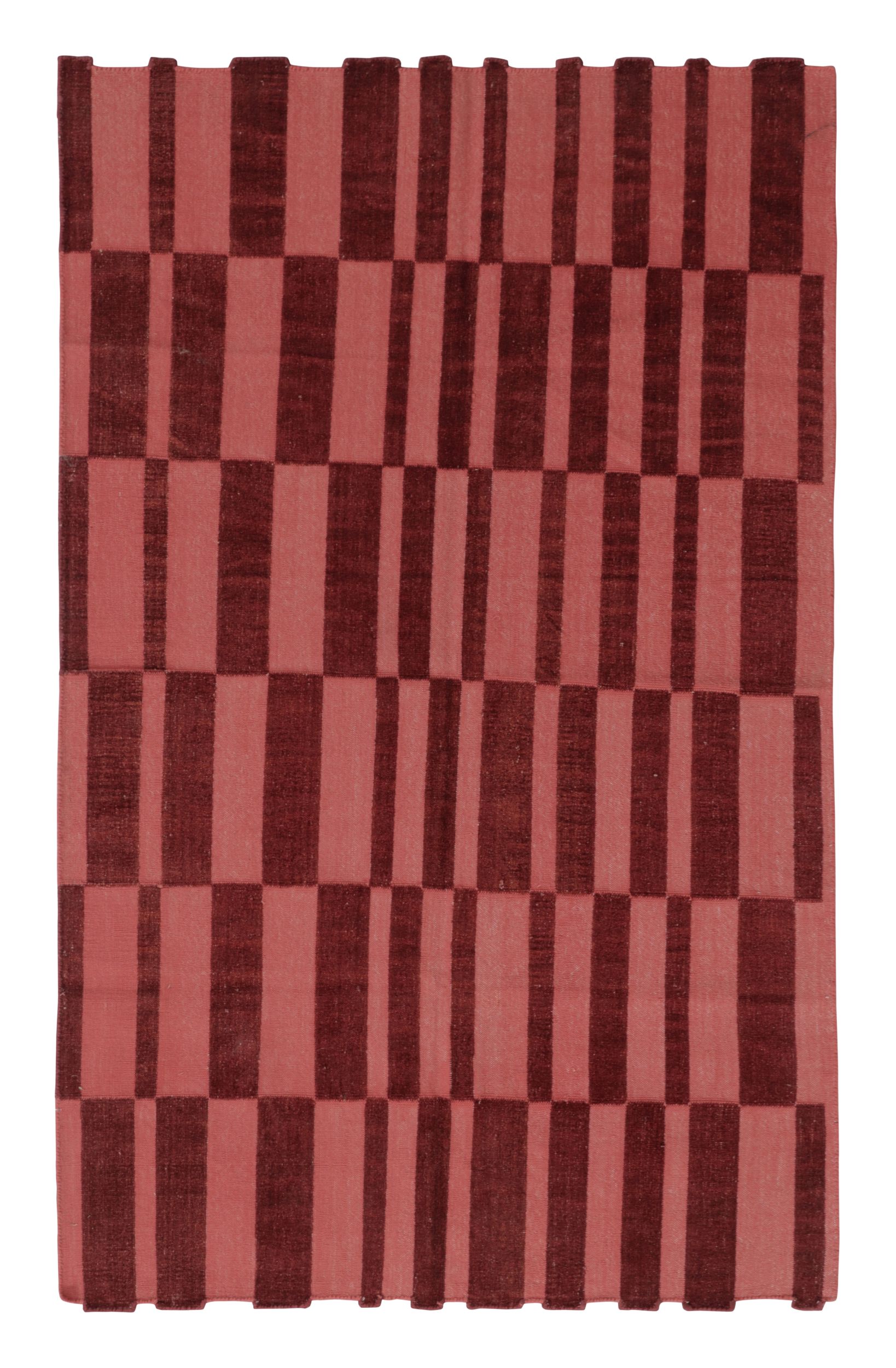What is the difference between a rug and a kilim?