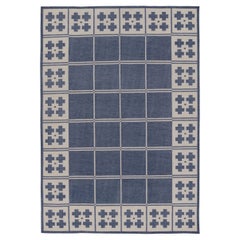 Rug & Kilim’s Contemporary India Dhurrie Rug in Navy and Beige Grid