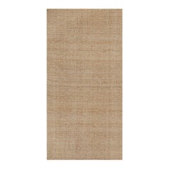 Rug & Kilim è un kilim contemporaneo in iuta di colore beige-marrone.
