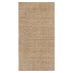 Rug & Kilim è un kilim contemporaneo in iuta di colore beige-marrone.