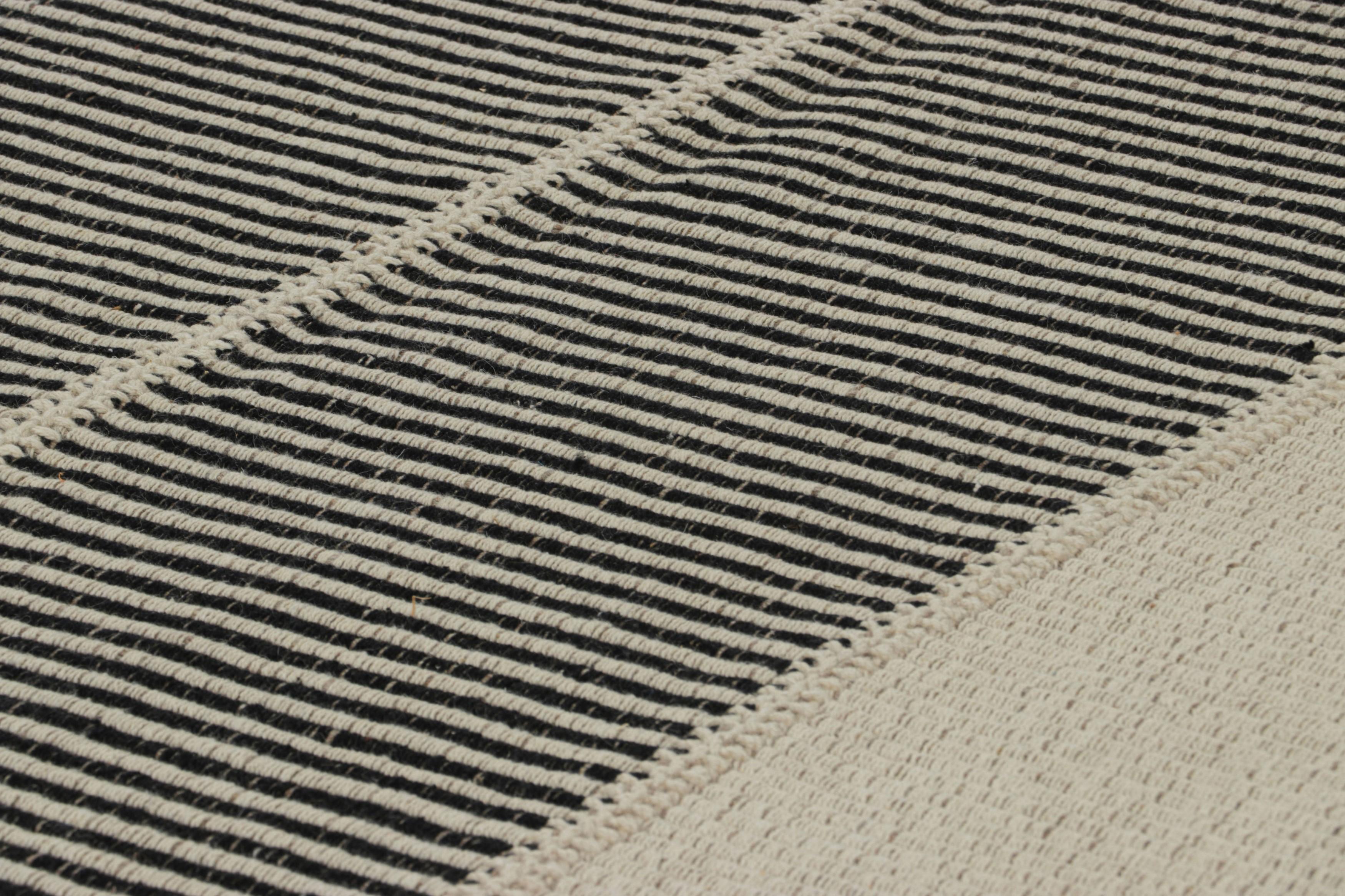 Handwoven in wool, this 10x11 contemporary Kilim is from an exciting new custom-capable flatweave collection by Rug & Kilim.

On the Design:

“Rez Kilim” represents a contemporary homage to Turkish and Persian panel-weaving styles in a textural