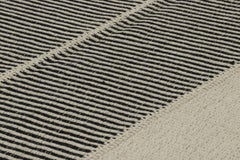 Rug & Kilim’s Contemporary Kilim, Black and Cream White with Textural Stripes
