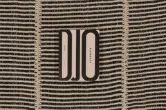 Rug & Kilim’s Contemporary Kilim, Cream White with Black Textural Stripes
