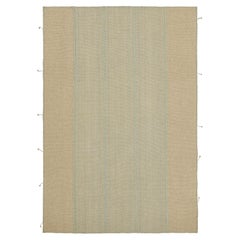 Rug 
Kilim è un kilim contemporaneo a strisce beige e blu.
