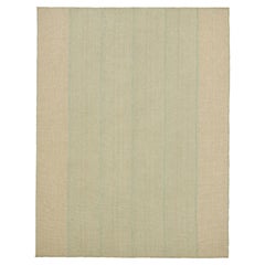 Rug
Kilim è un kilim contemporaneo a strisce beige e blu.