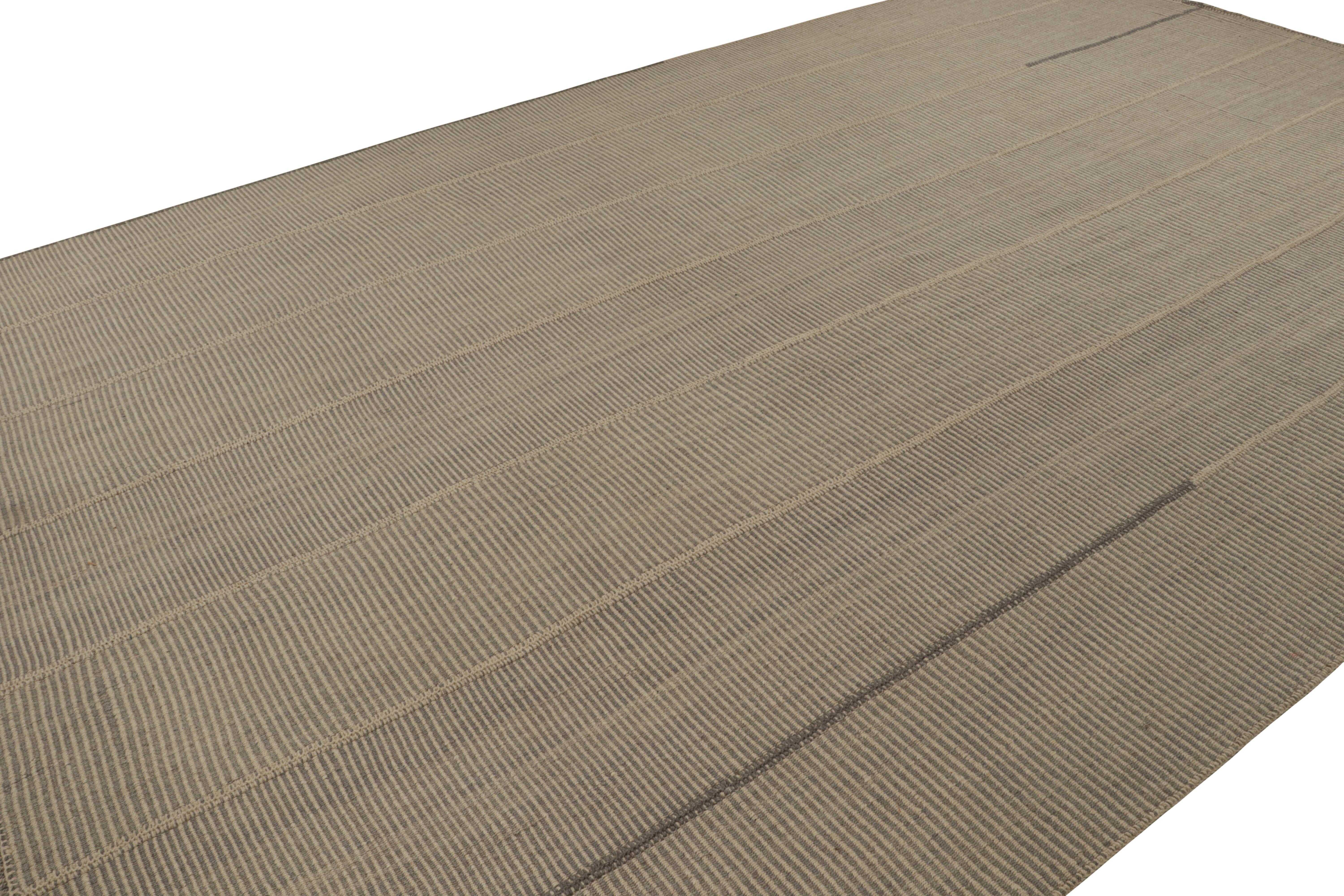 Handwoven in wool, a 12x18 Kilim in Beige and Brown, from a bold new line of contemporary flatweaves, ‘Rez Kilim’, by Rug & Kilim.

On the design: 

Connoting a modern take on classic panel-weaving, our latest “Rez Kilim” enjoys beige and brown