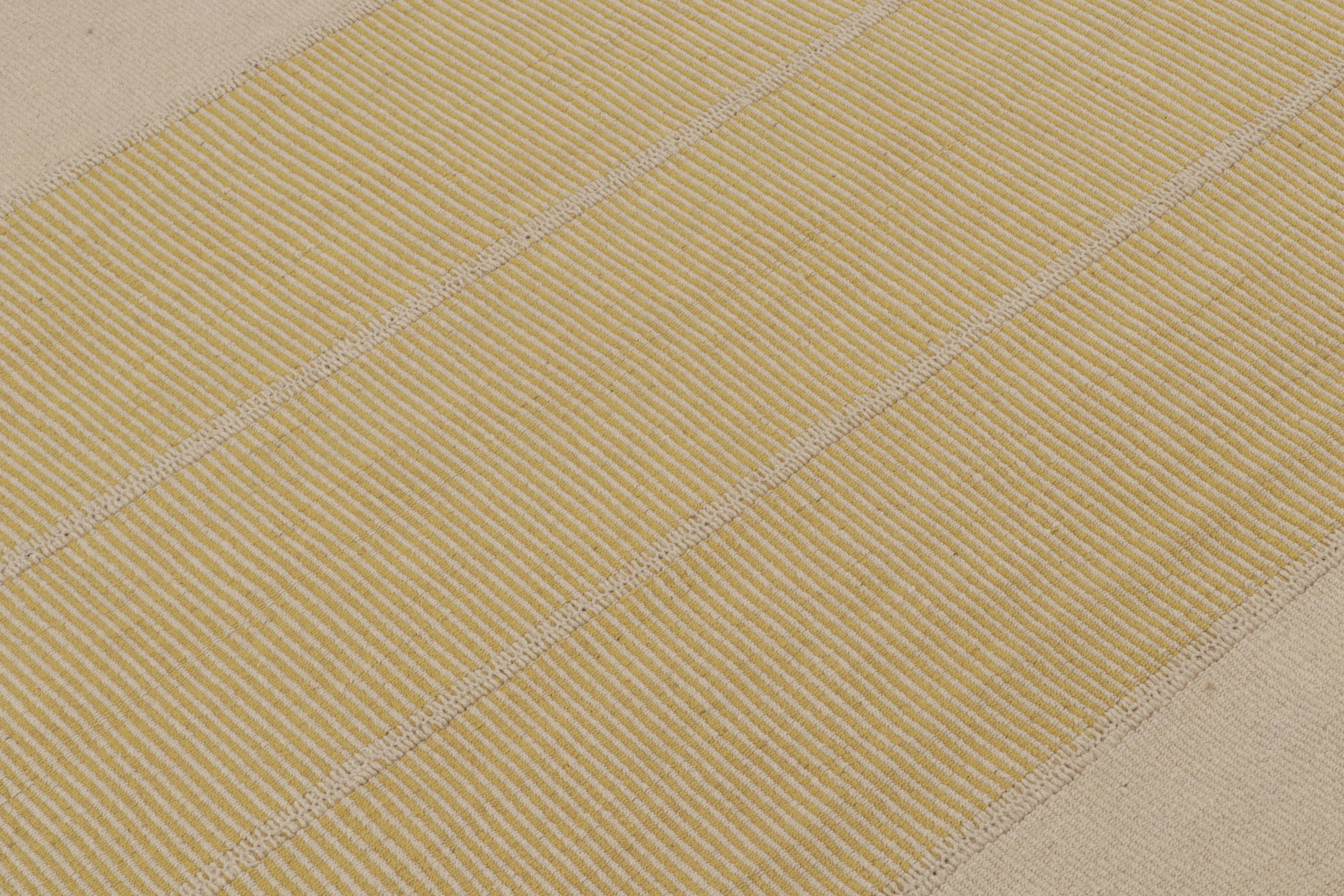 Handwoven in wool, an 8x10 Kilim from a bold new line of contemporary flatweaves by Rug & Kilim.

On the Design: 

Connoting a modern take on classic panel-weaving, our latest “Rez Kilim” enjoys beige & gold tones. Keen eyes will admire how this