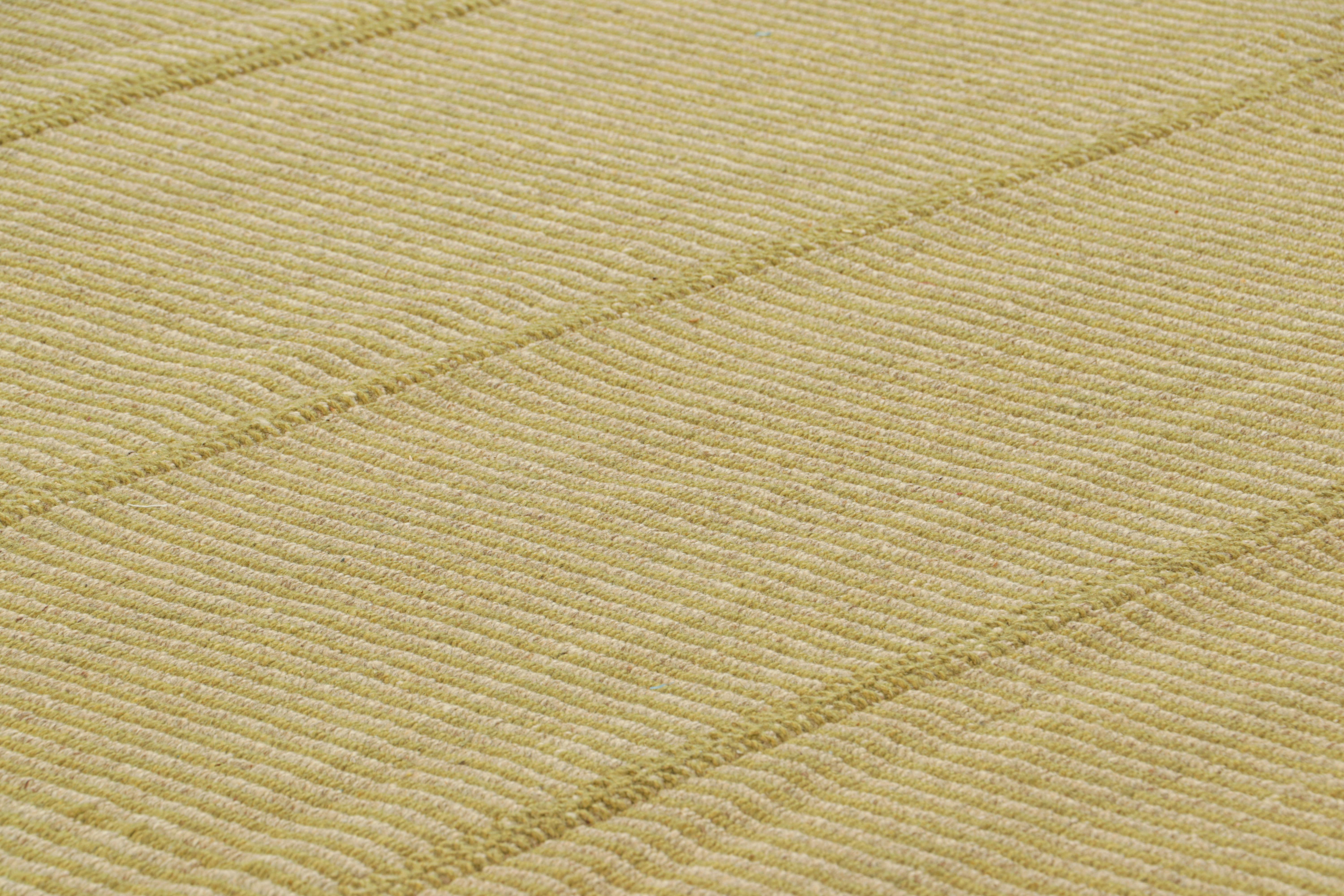 Handwoven in wool, a 10x12 Kilim design from an inventive new contemporary flat weave collection by Rug & Kilim.

On the Design: 

Fondly dubbed, “Rez Kilims”, this modern take on classic panel-weaving enjoys a fabulous, unique play of gold and
