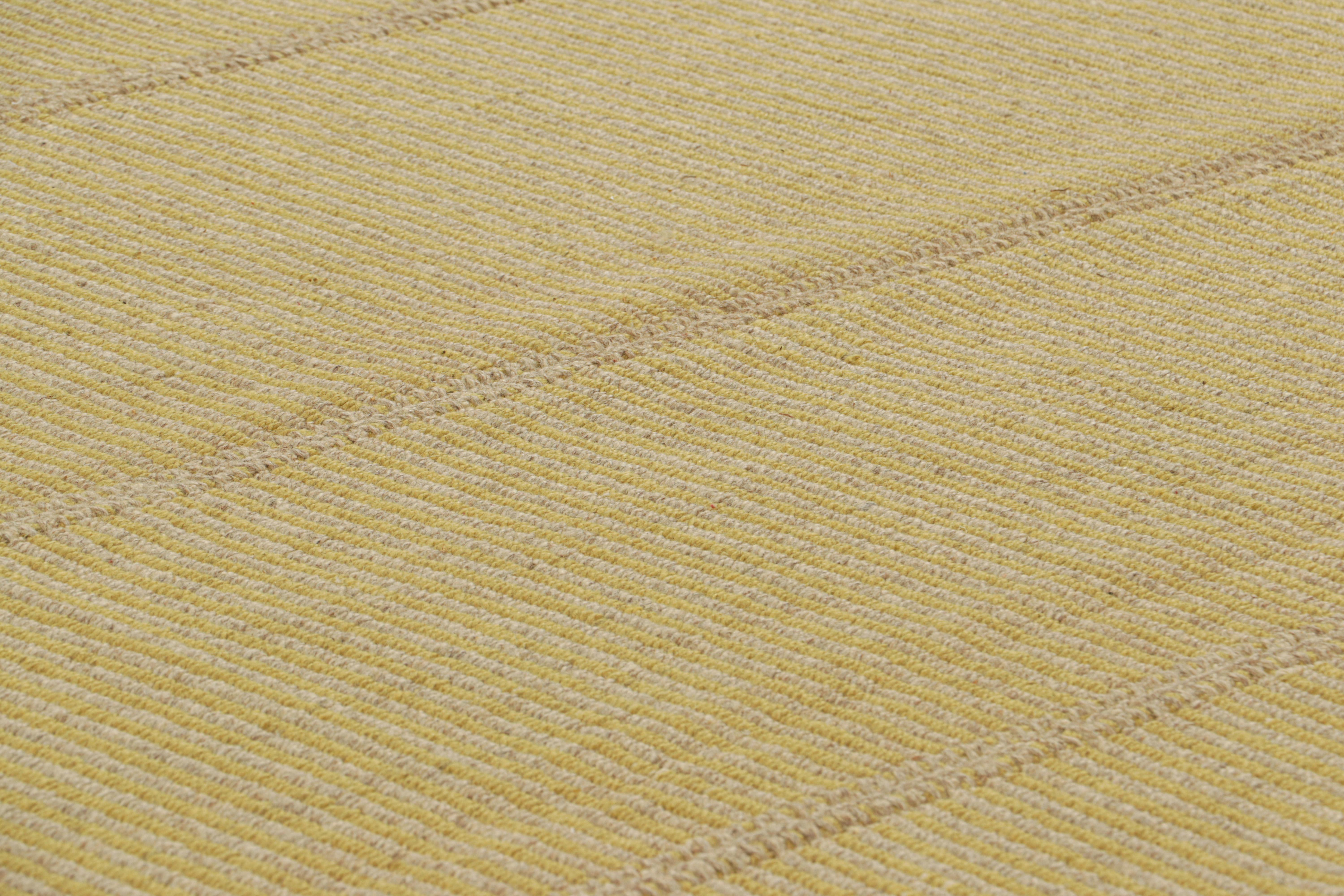 Handwoven in wool, a 9x12 Kilim design from an inventive new contemporary flat weave collection by Rug & Kilim.

On the Design: 

Fondly dubbed, “Rez Kilims”, this modern take on classic panel-weaving enjoys a fabulous, unique play of beige and gold