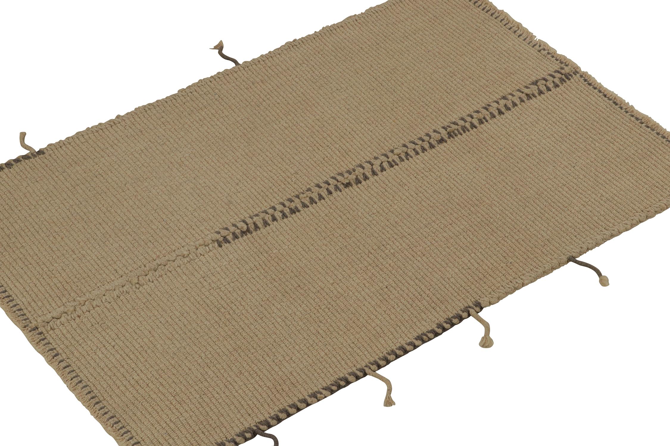 Handwoven in wool, a gift-sized 3x4 Kilim from an innovative new contemporary flat weave collection by Rug & Kilim.

On the Design: The “Rez Kilim” connotes a modern take on classic panel weaving—this edition enjoying warm beige-brown with gray