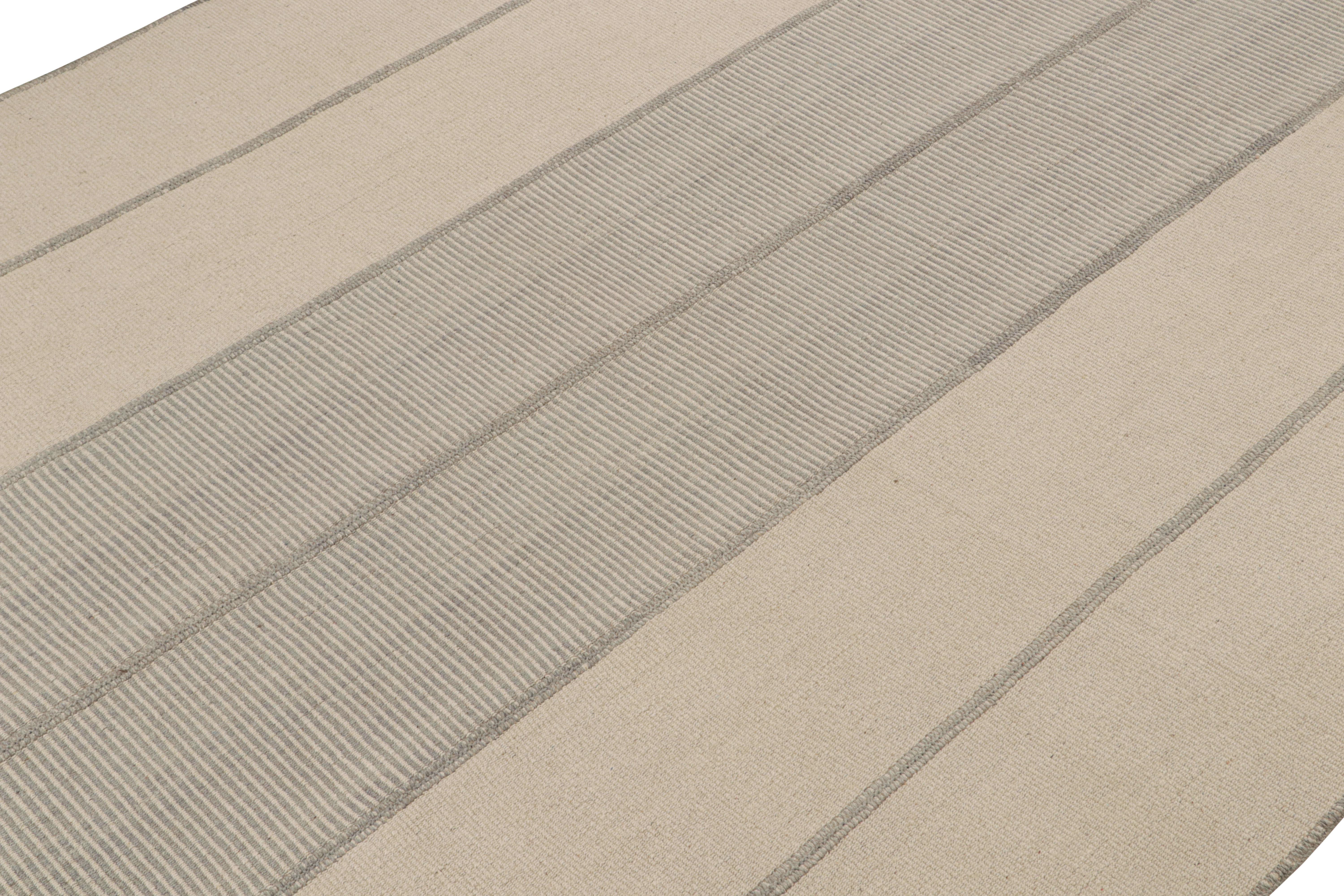 Handwoven in wool, a 10x15 Kilim from a bold new line of contemporary flatweaves by Rug & Kilim.

On the Design: 

Connoting a modern take on classic panel-weaving, our latest “Rez Kilim” enjoys beige & Gray tones. Keen eyes will admire how this