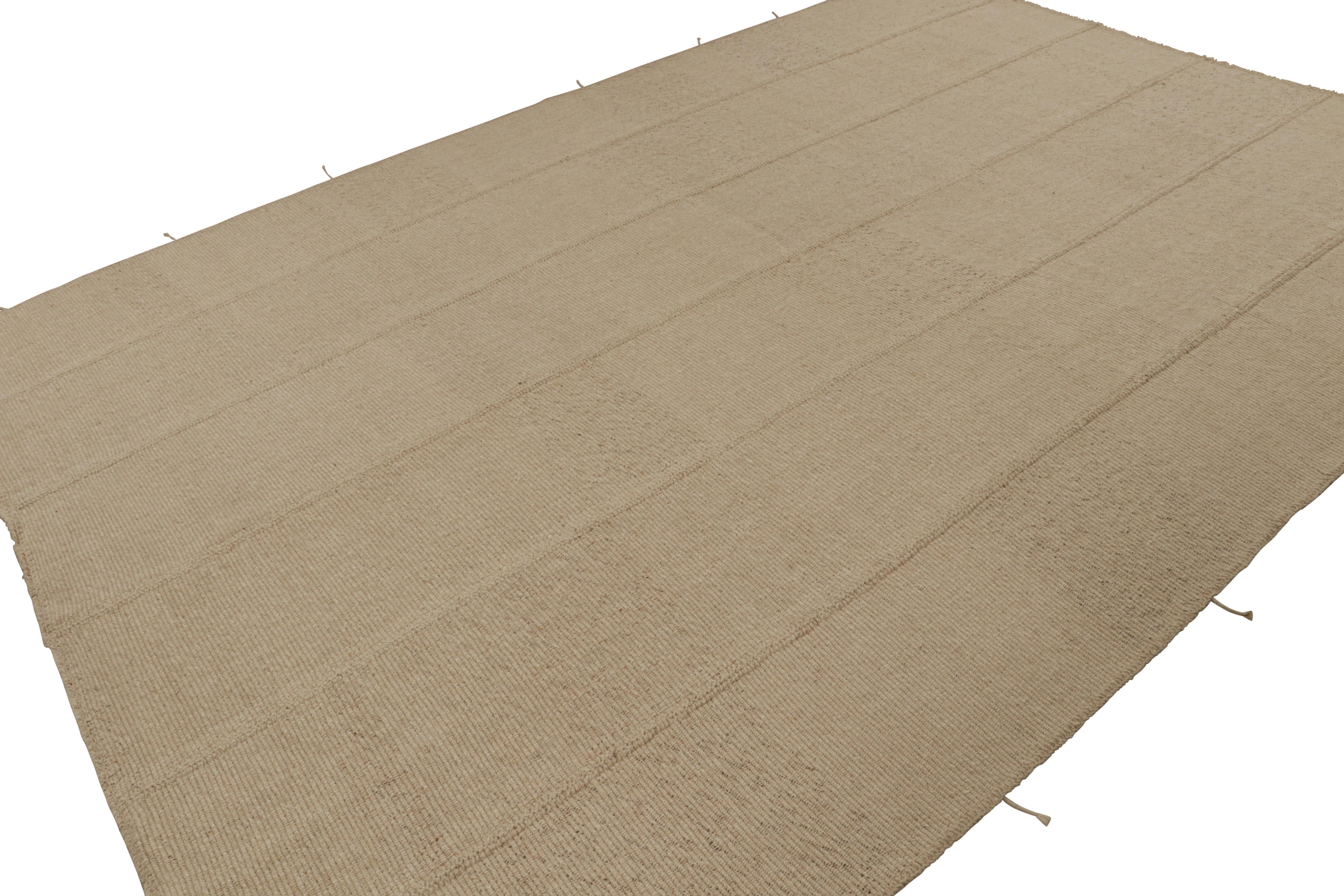Handwoven in wool, a 10x15 Kilim rug from a bold new line of contemporary flatweaves, ‘Rez Kilim’, by Rug & Kilim.

On the Design:  

Connoting a modern take on classic panel-weaving, our latest “Rez Kilim” enjoys beige and ivory tones with beige