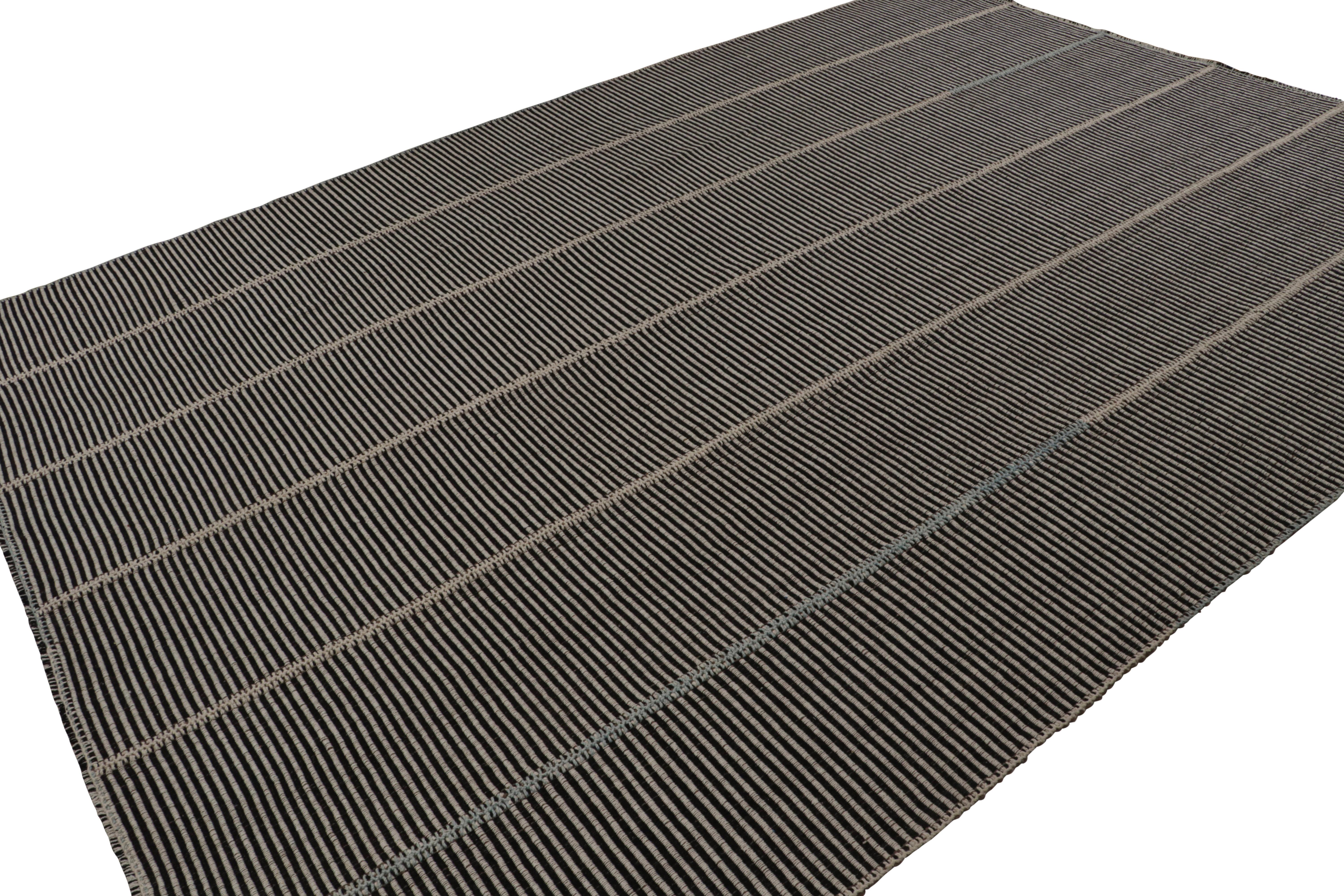 Handwoven in wool, a 10×14 Kilim in Black with Brown and Green accents, from a bold new line of contemporary flatweaves, ‘Rez Kilim’, by Rug & Kilim.

On the design:  

Connoting a modern take on classic panel-weaving, our latest “Rez Kilim” enjoys