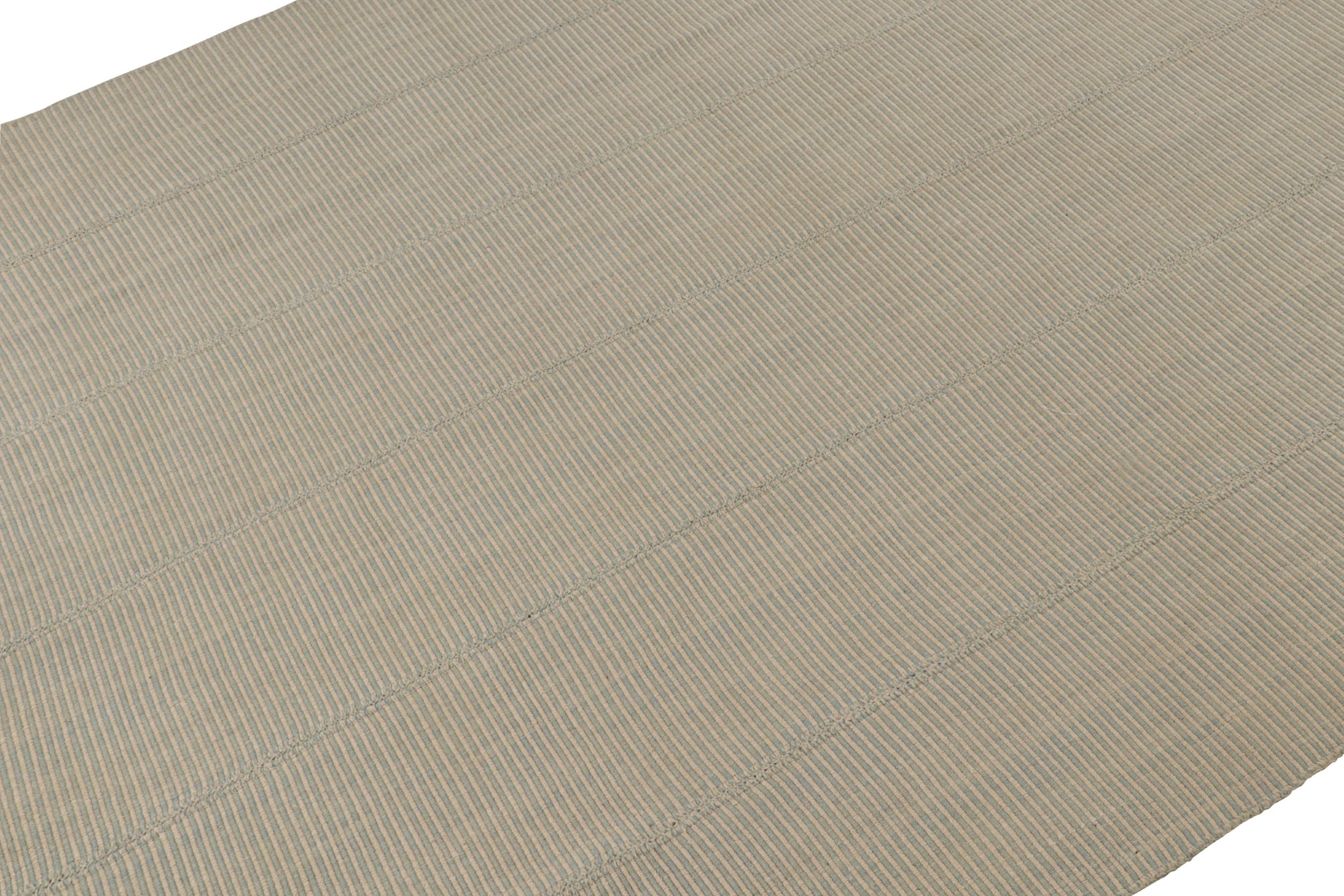 Handwoven in wool, a 10x14 Kilim from a bold new line of contemporary flatweaves by Rug & Kilim.

On the Design:

Connoting a modern take on classic panel-weaving, our latest “Rez Kilim” enjoys blue and cream tones. Keen eyes will admire how this