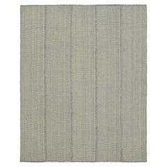 Rug & Kilim's Contemporary Kilim in blauen und grauen Strukturstreifen