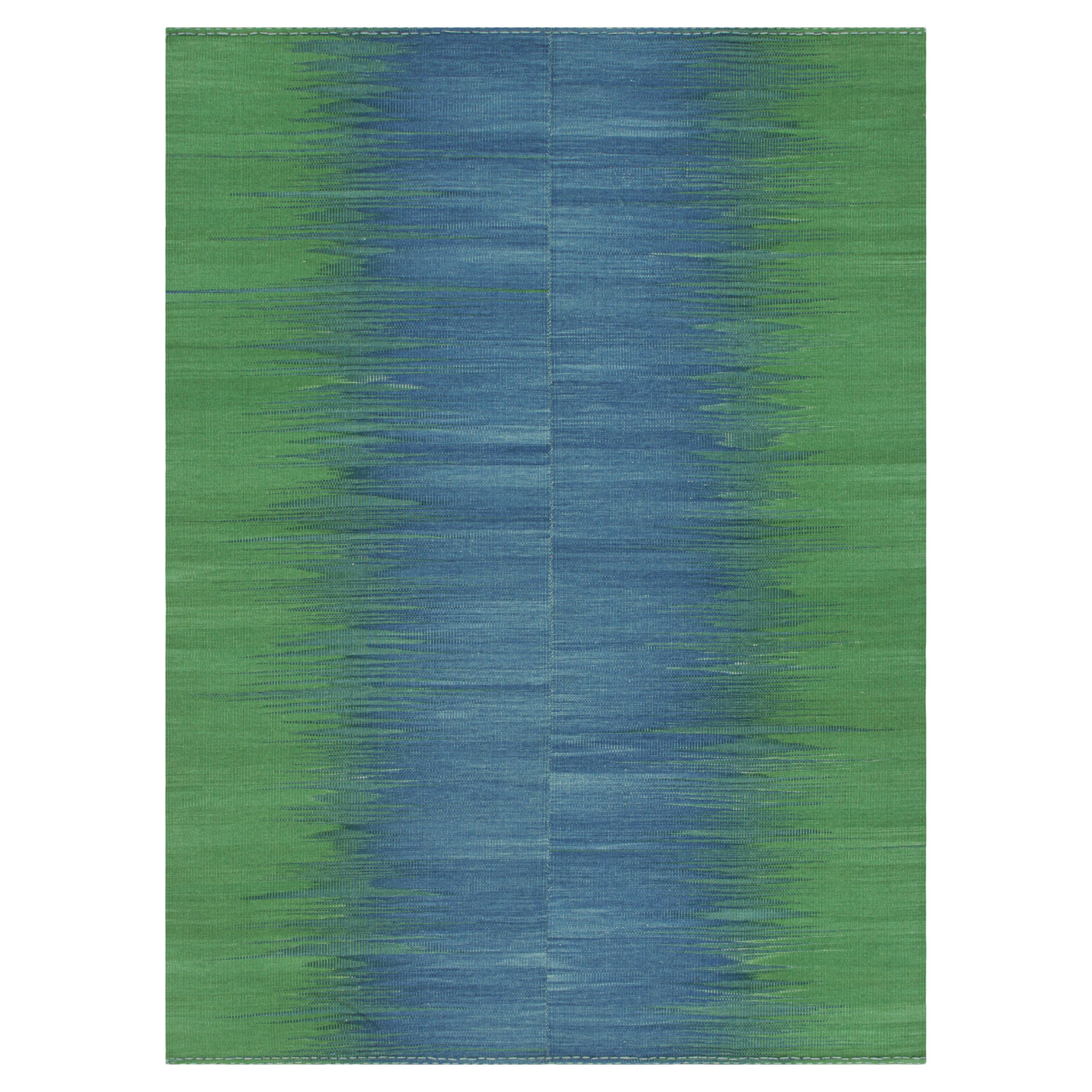 Rug
Kilim: Kilim contemporaneo a strisce blu e verdi e motivo geometrico