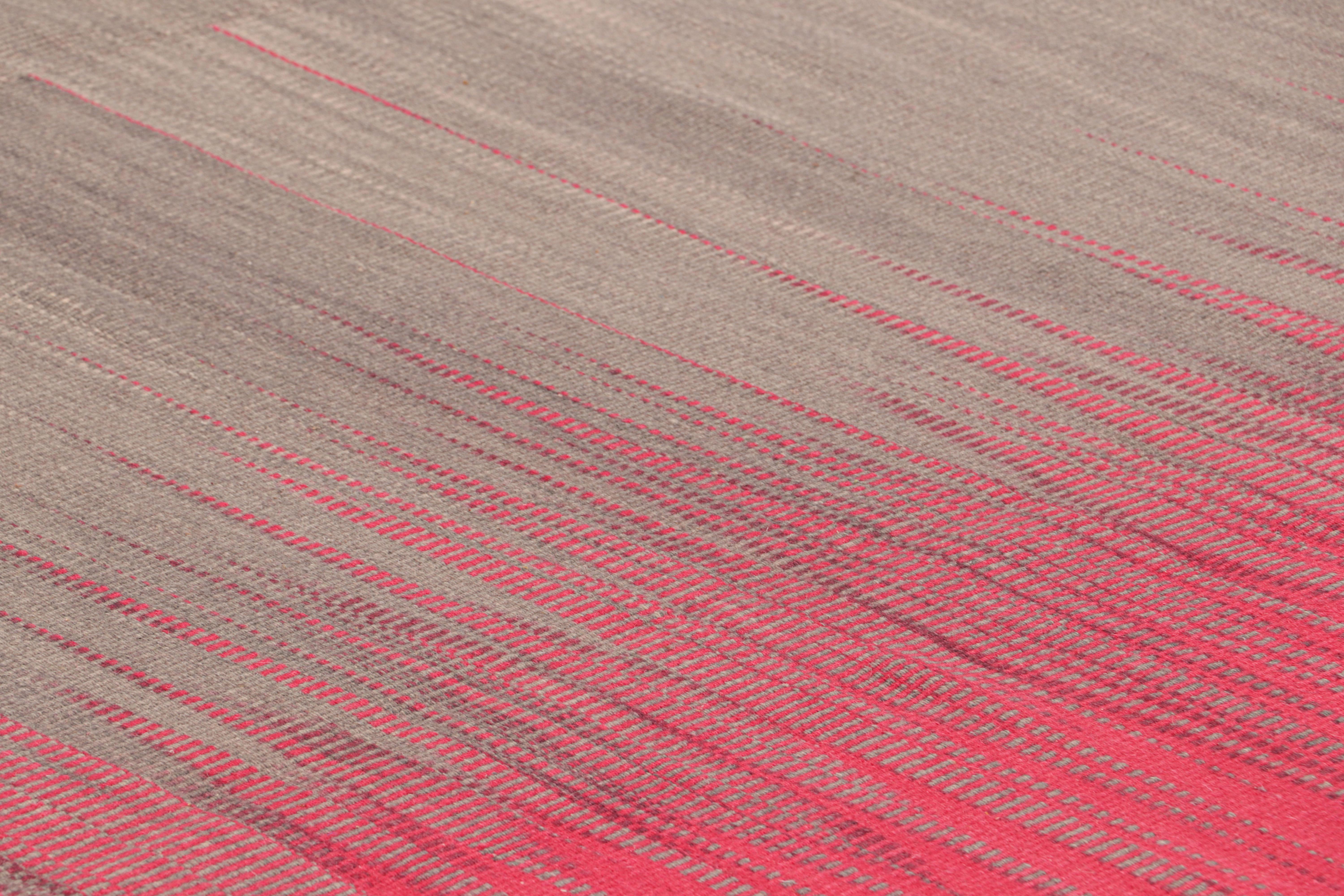Handwoven in wool, this 10x12 Kilim is from an inventive new contemporary flat weave collection by Rug & Kilim.

On the Design: 

This modern take on classic panel-weaving enjoys a fabulous, unique play of brown and pink textural stripes and
