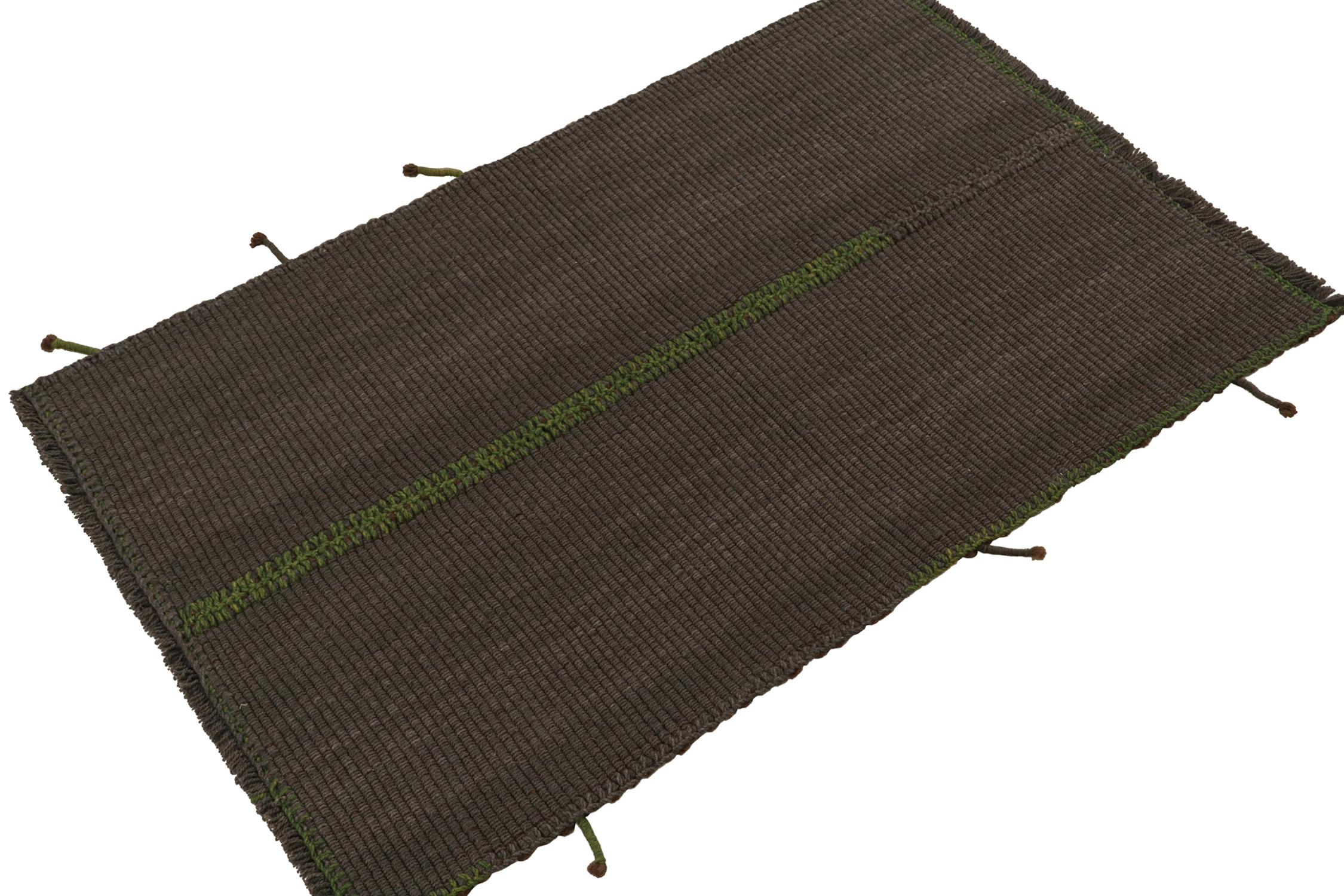 Handwoven in wool, a 3x4 gift-sized Kilim from an inventive new contemporary flat weave collection by Rug & Kilim.
On the Design: The “Rez Kilim” connotes a modern take on classic panel weaving—enjoying brown columns with refreshing green accents.