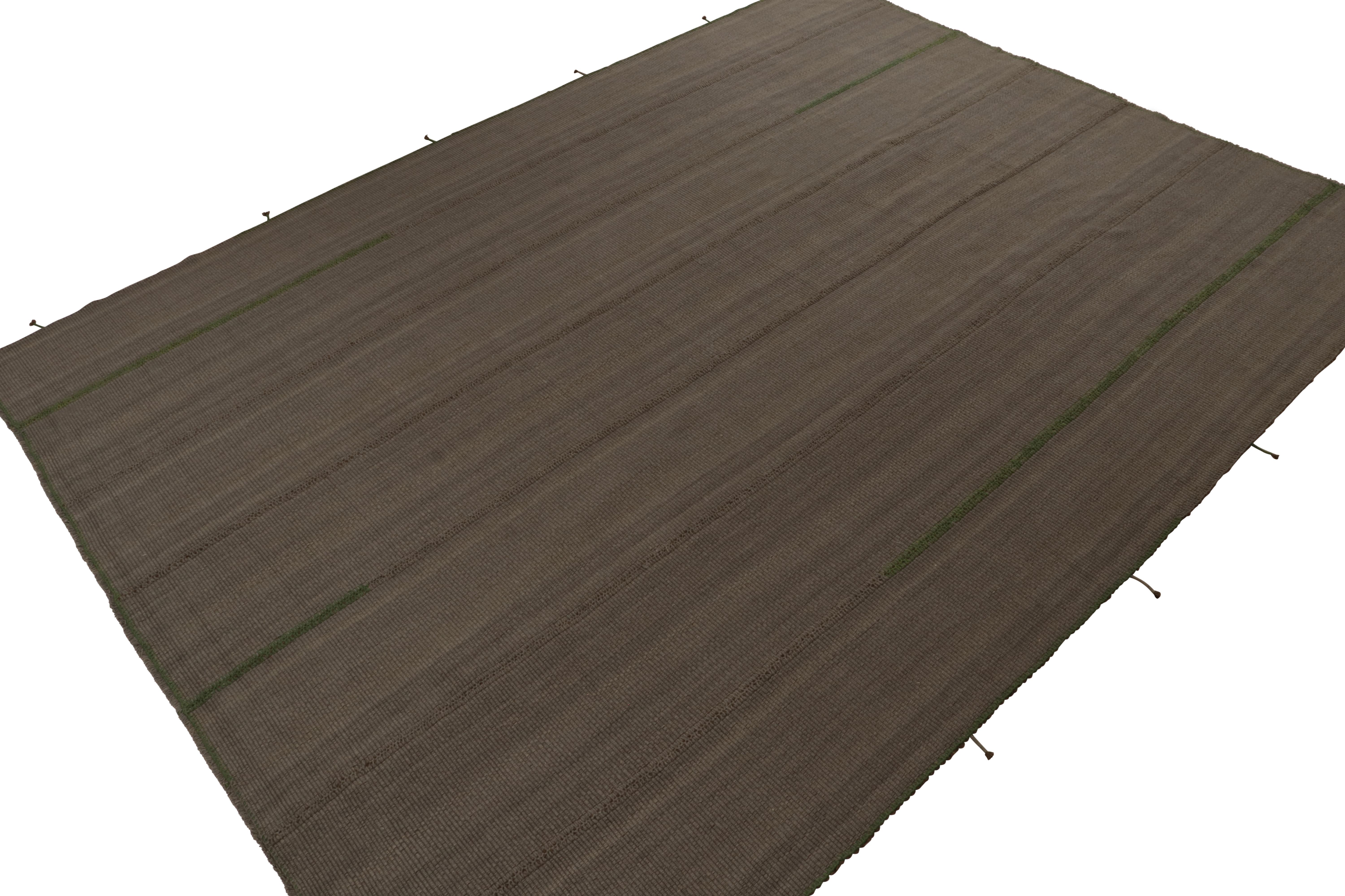 Handwoven in wool, a 12x16 Kilim from a bold new line of contemporary flatweaves by Rug & Kilim.

On the Design: The “Rez Kilim” connotes a modern take on classic panel weaving. This edition enjoys a rich brown with gray undertones and subdued green