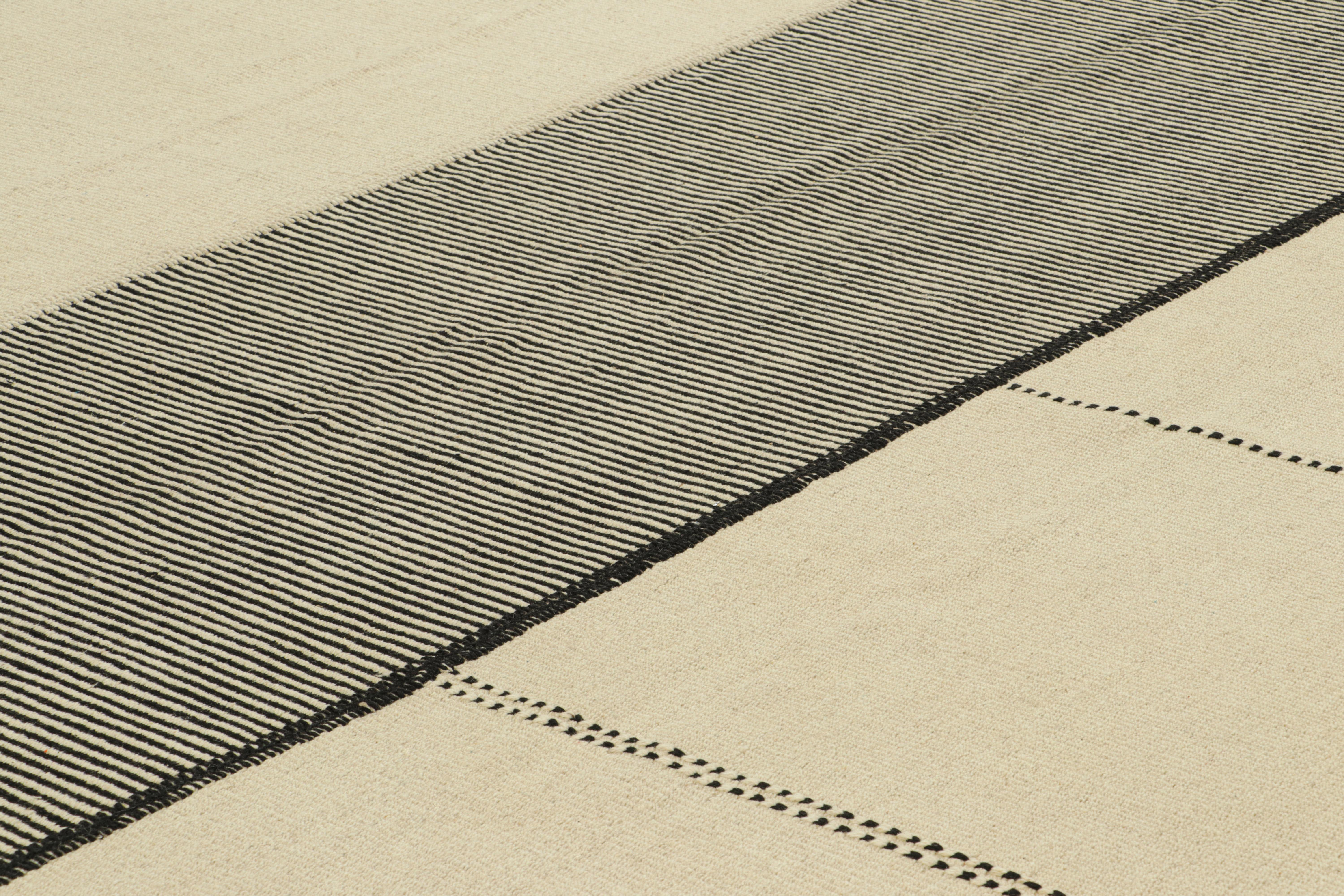 Handwoven in wool, this 8x11 Kilim is from an inventive new contemporary flat weave collection by Rug & Kilim.

On the Design: 

Fondly dubbed, “Rez Kilims”, this modern take on classic panel-weaving enjoys a fabulous, unique play of cream white and