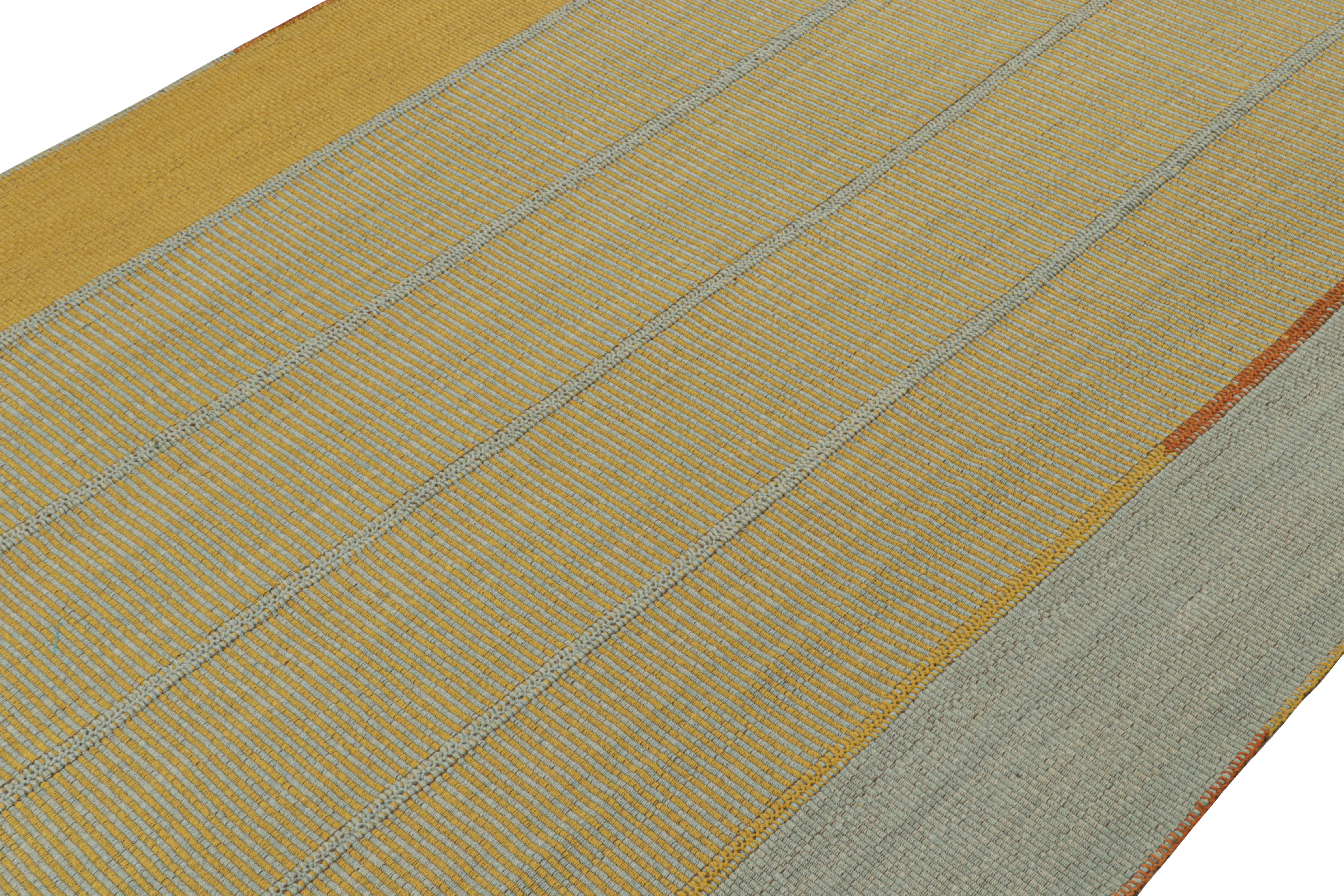 Handwoven in wool, a 9×12 Kilim from a bold new line of contemporary flatweaves by Rug & Kilim.

On the Design:

Connoting a modern take on classic panel-weaving, our latest “Rez Kilim” enjoys light blue and gold stripes, with a single orange accent
