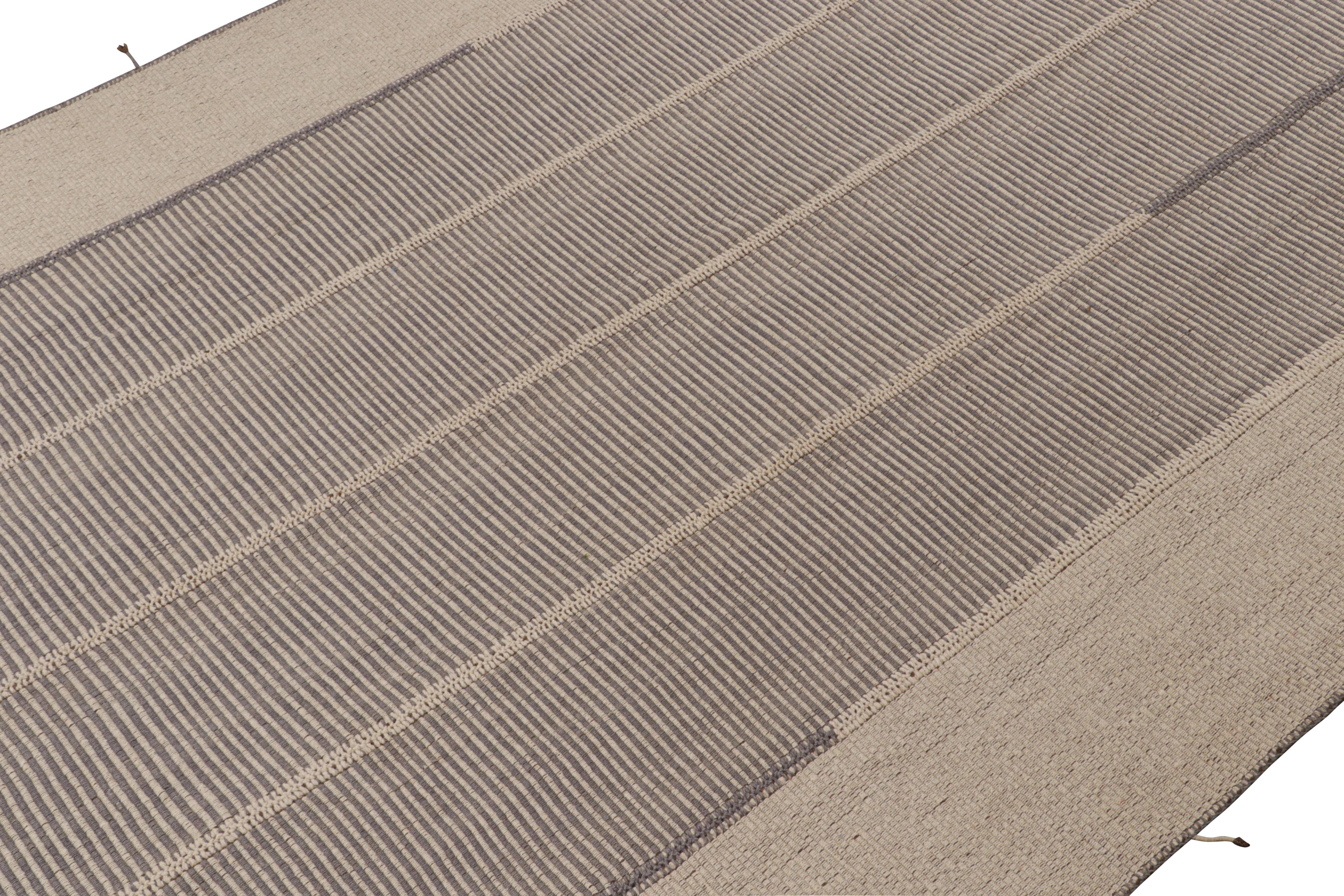 Handwoven in wool, a 10x14 Kilim design from an inventive new contemporary flat weave collection by Rug & Kilim.

On the Design: 

Fondly dubbed, “Rez Kilims”, this modern take on classic panel-weaving enjoys a fabulous, unique play of gray,