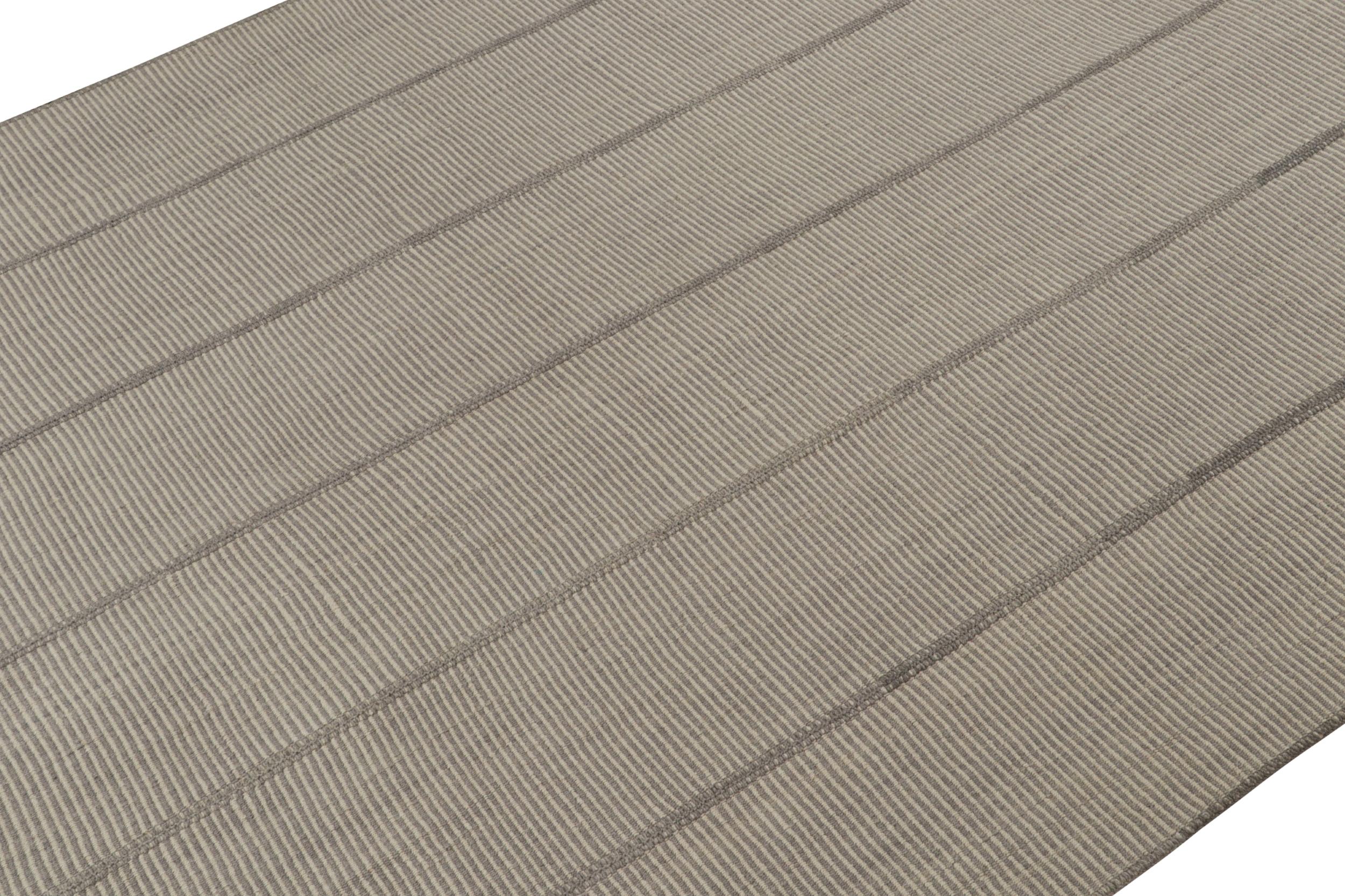 Handwoven in wool, a 10x14 Kilim from a bold new line of contemporary flatweaves by Rug & Kilim.

On the Design: 

Connoting a modern take on classic panel-weaving, our latest “Rez Kilim” enjoys cream & Gray tones. Keen eyes will admire how this