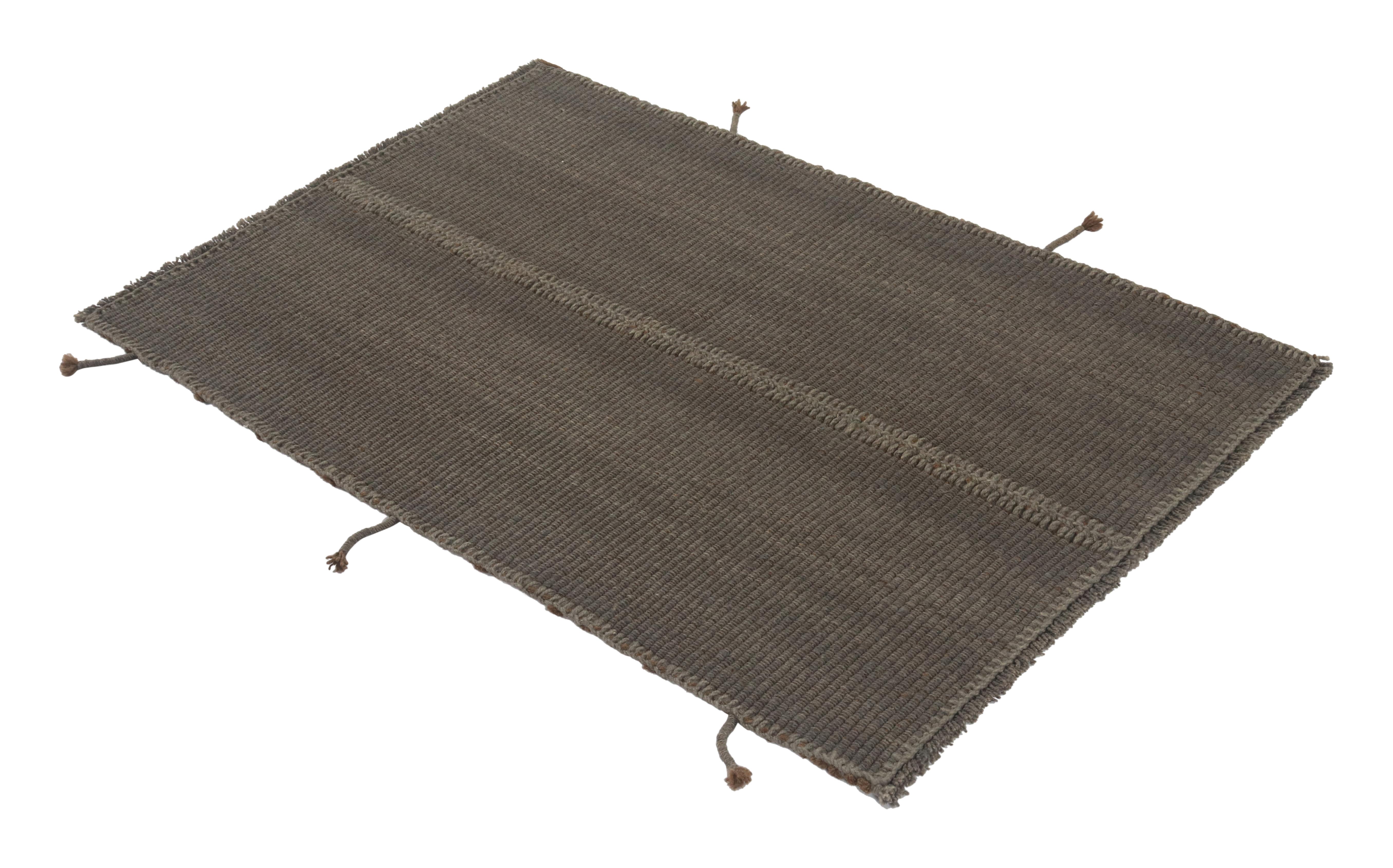 Handwoven in wool, a gift-sized 3x4 Kilim from an innovative new contemporary flat weave collection by Rug & Kilim.
On the Design:
The “Rez Kilim” connotes a modern take on classic panel weaving, with cool gray with subtle brown accents. Keen eyes