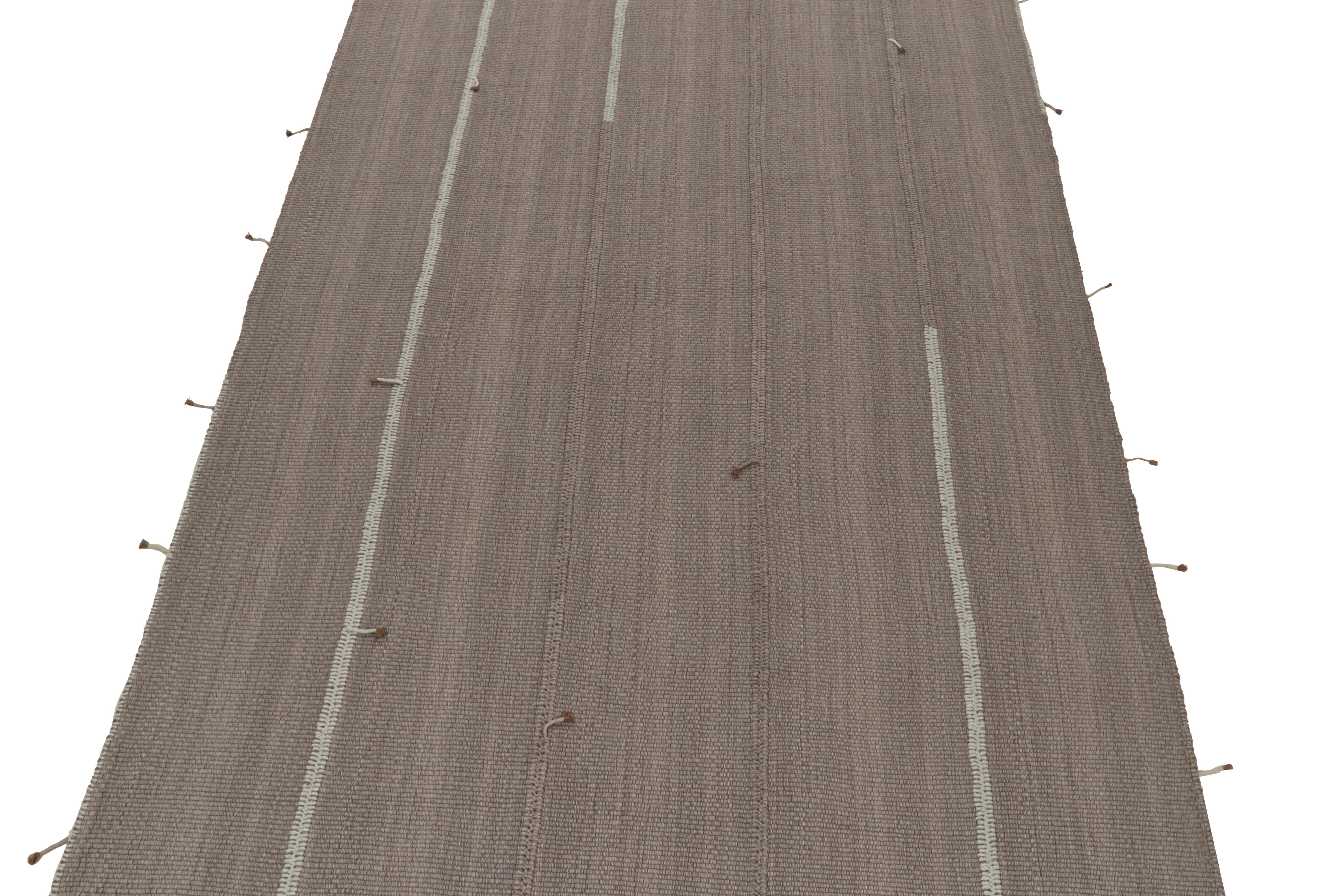 Tessuto a mano in lana, questo Kilim 9x12 fa parte di una nuova linea di tessuti piatti contemporanei di Rug & Kilim.

Ulteriori informazioni sul design:

Il 