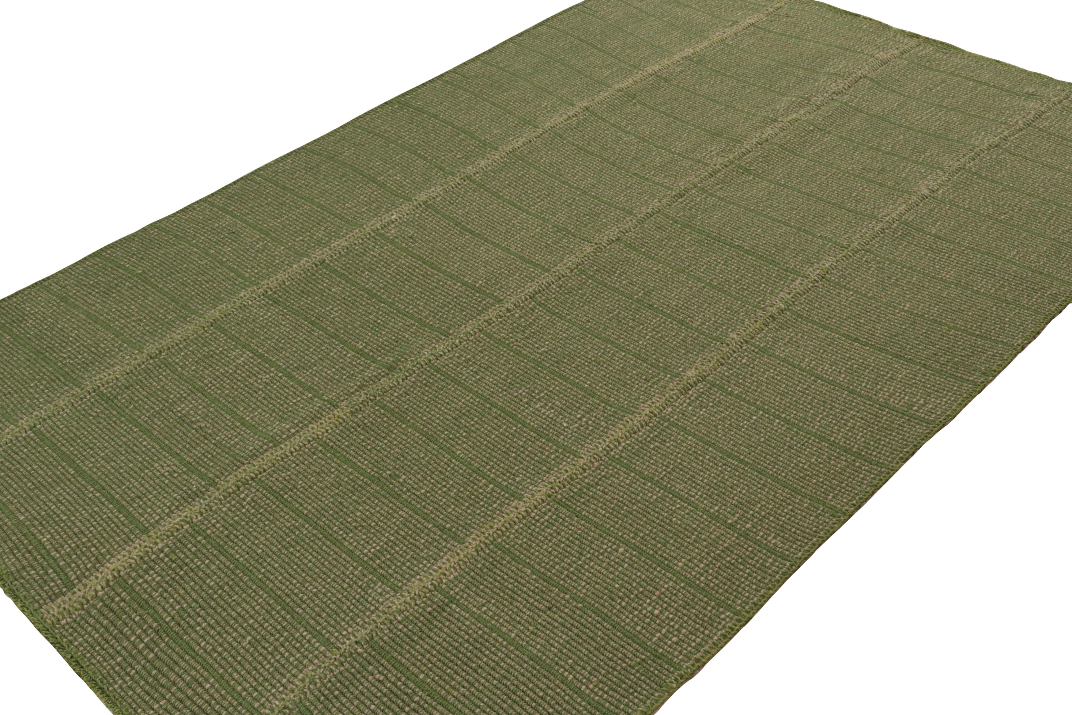Handwoven in wool, a 6x9 Kilim in Green with Beige accents, from a bold new line of contemporary flatweaves, ‘Rez Kilim’, by Rug & Kilim.

On the Design: 

Connoting a modern take on classic panel-weaving, our latest “Rez Kilim” enjoys green and