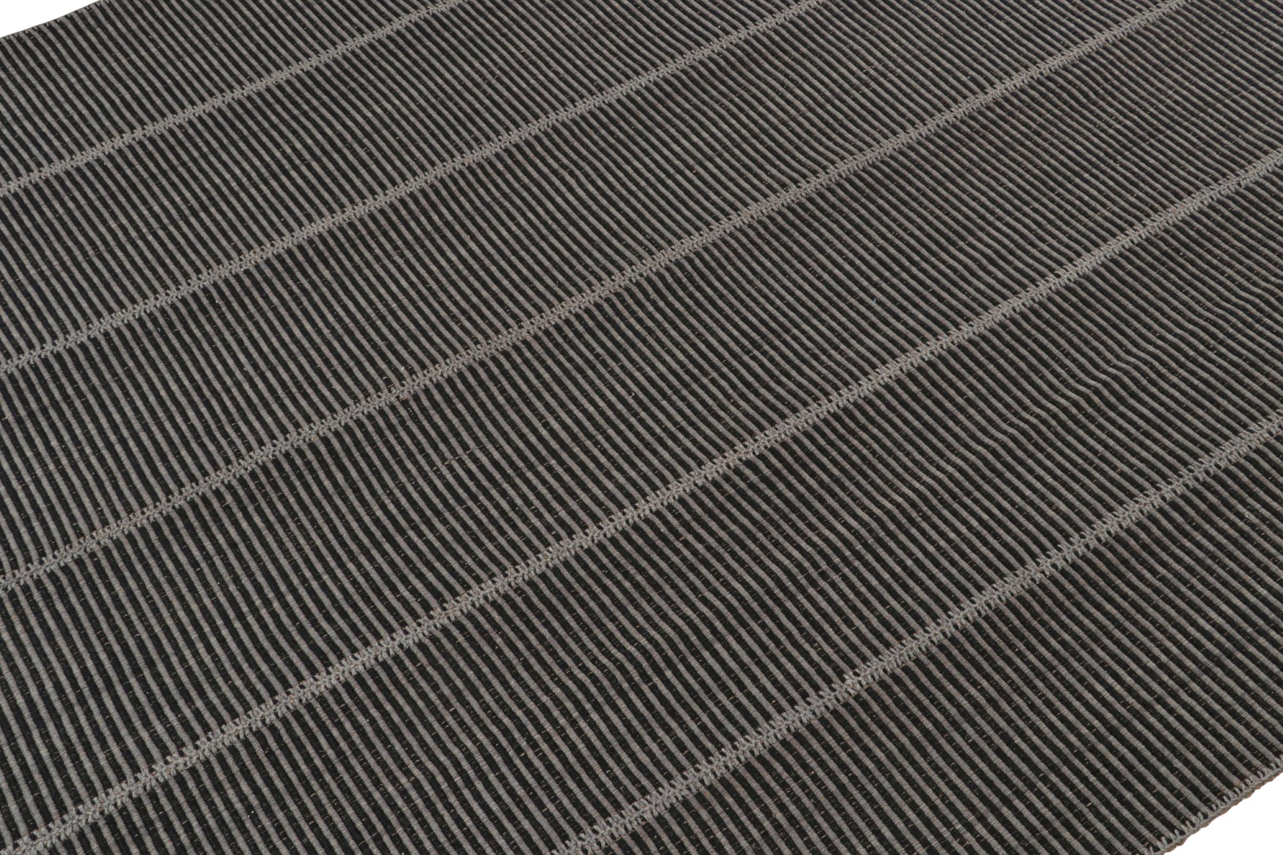 Handwoven in wool, a 10x14 Kilim from a bold new line of contemporary flatweaves by Rug & Kilim.

On the Design: 

Connoting a modern take on classic panel-weaving, our latest “Rez Kilim” enjoys black & Gray tones. Keen eyes will admire how this