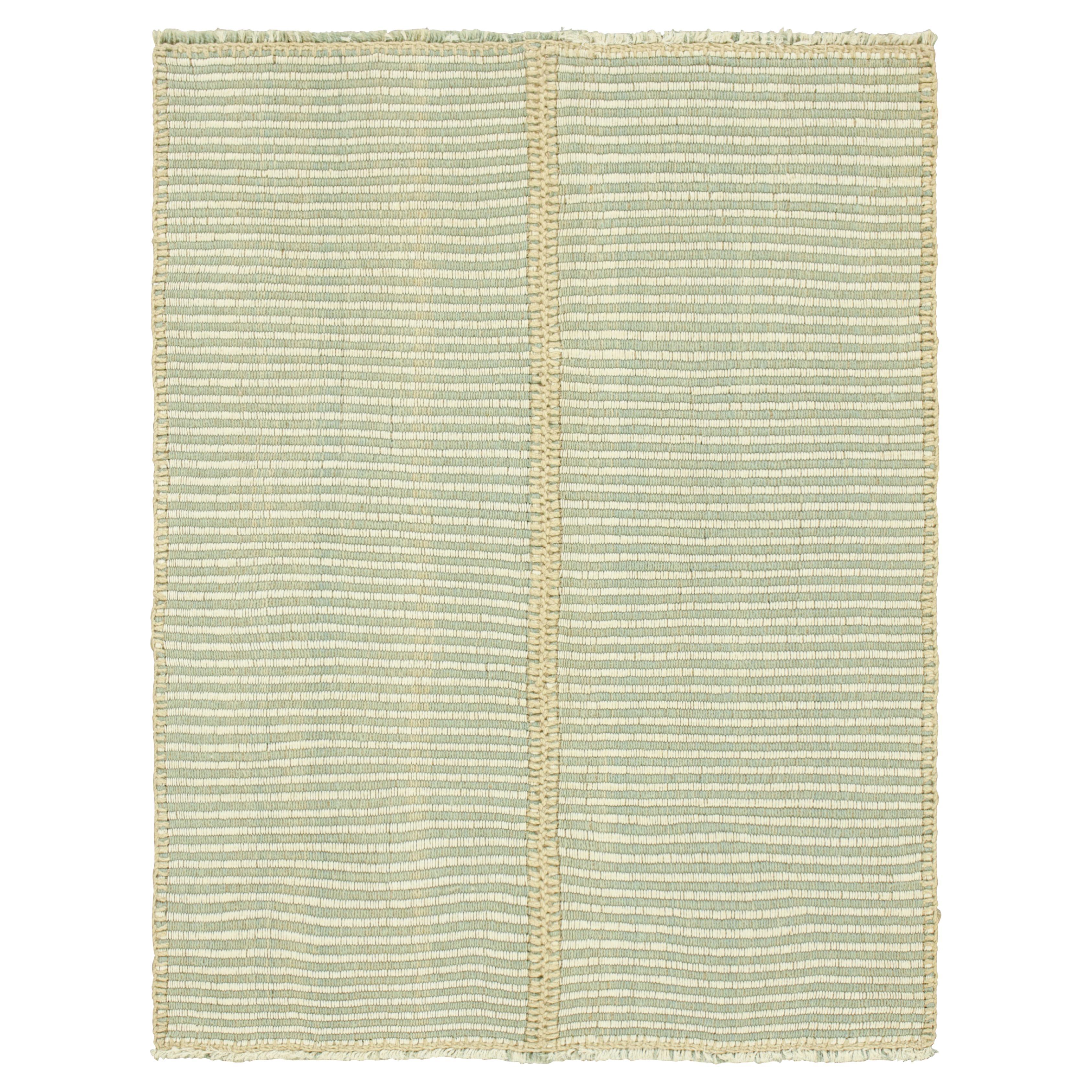 Rug & Kilim’s Contemporary Kilim in Ivory White and Blue Textural Stripes