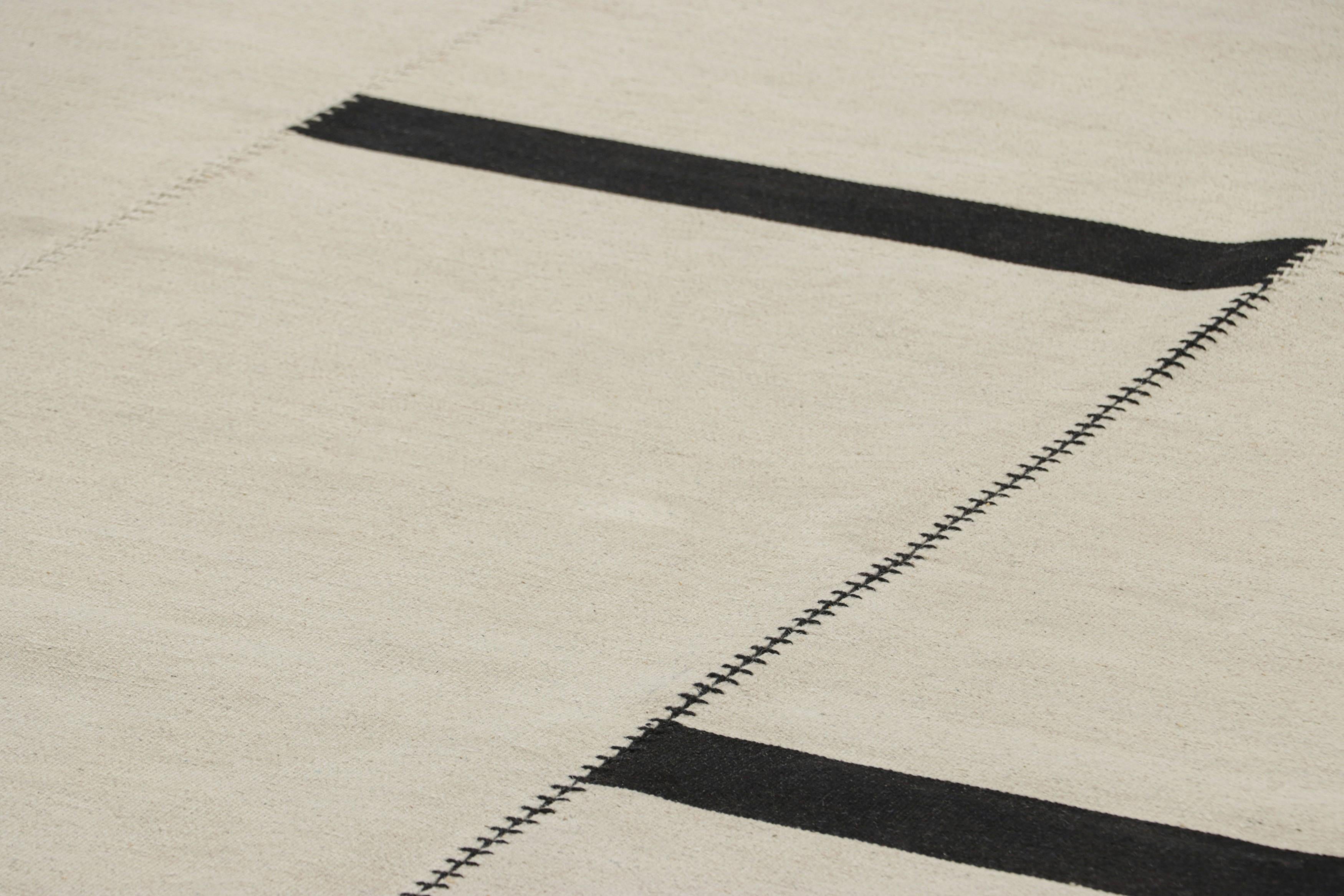 Handwoven in wool, this 9x12 contemporary Kilim is from an exciting new custom-capable flatweave collection by Rug & Kilim.

On the Design:

From our beloved “Rez Kilim” collection, a contemporary homage to Turkish and Persian panel-weaving styles,
