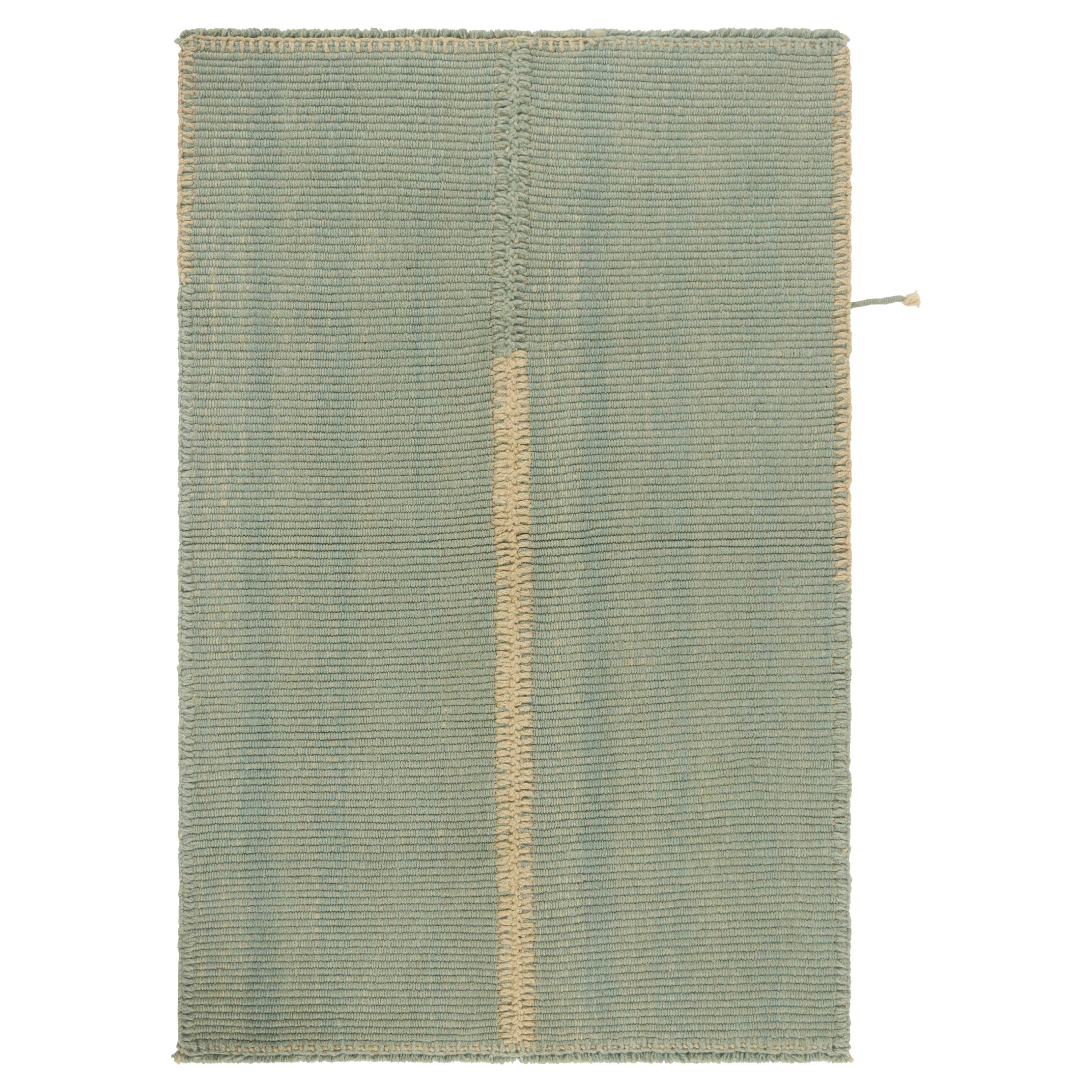 Rug & Kilim’s Contemporary Kilim in Light Blue with Off-White Accents