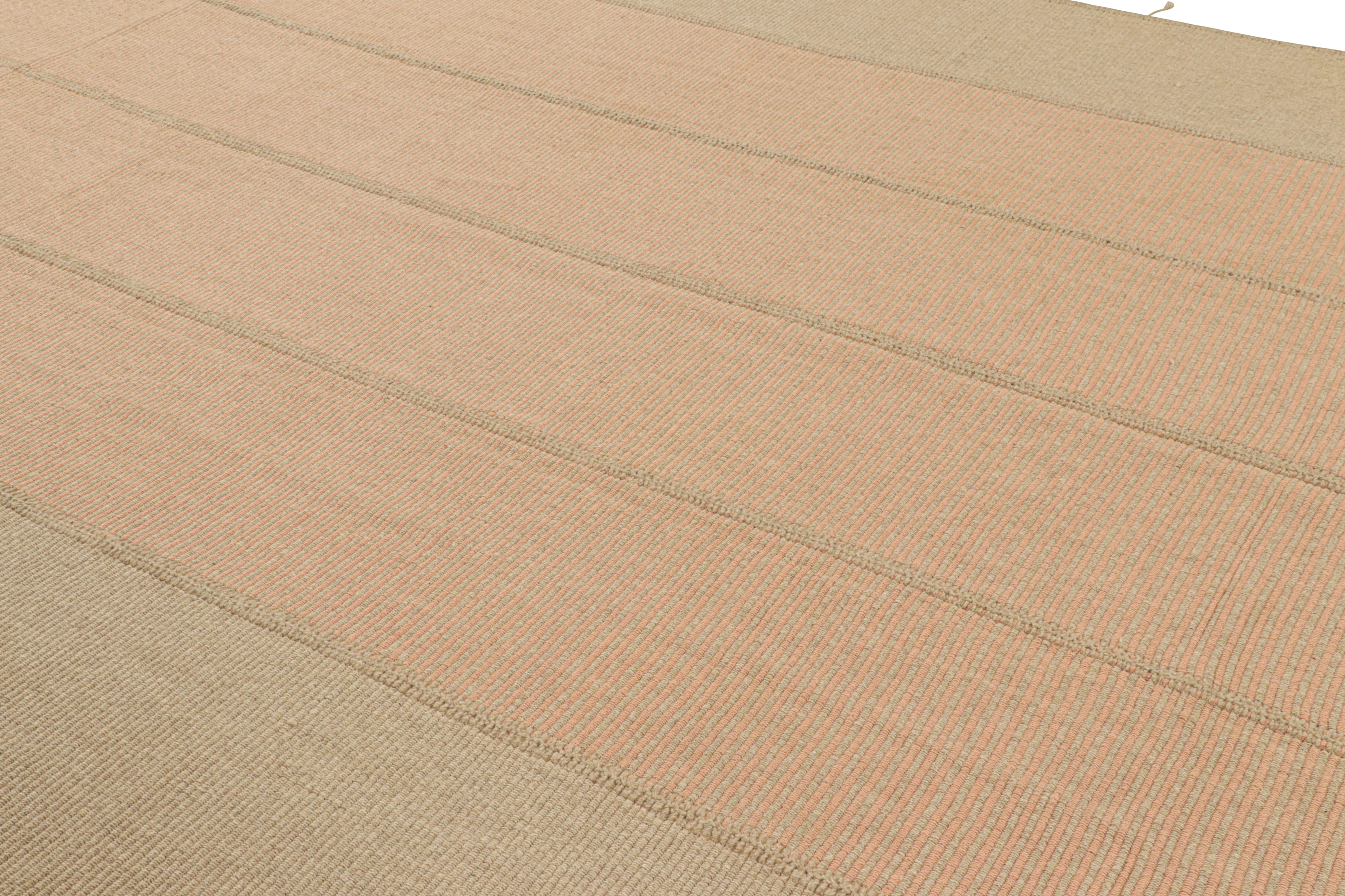 Handwoven in wool, a 10x14 Kilim design from an inventive new contemporary flat weave collection by Rug & Kilim.

On the Design: 

Fondly dubbed, “Rez Kilims”, this modern take on classic panel-weaving enjoys a fabulous, unique play of peach and
