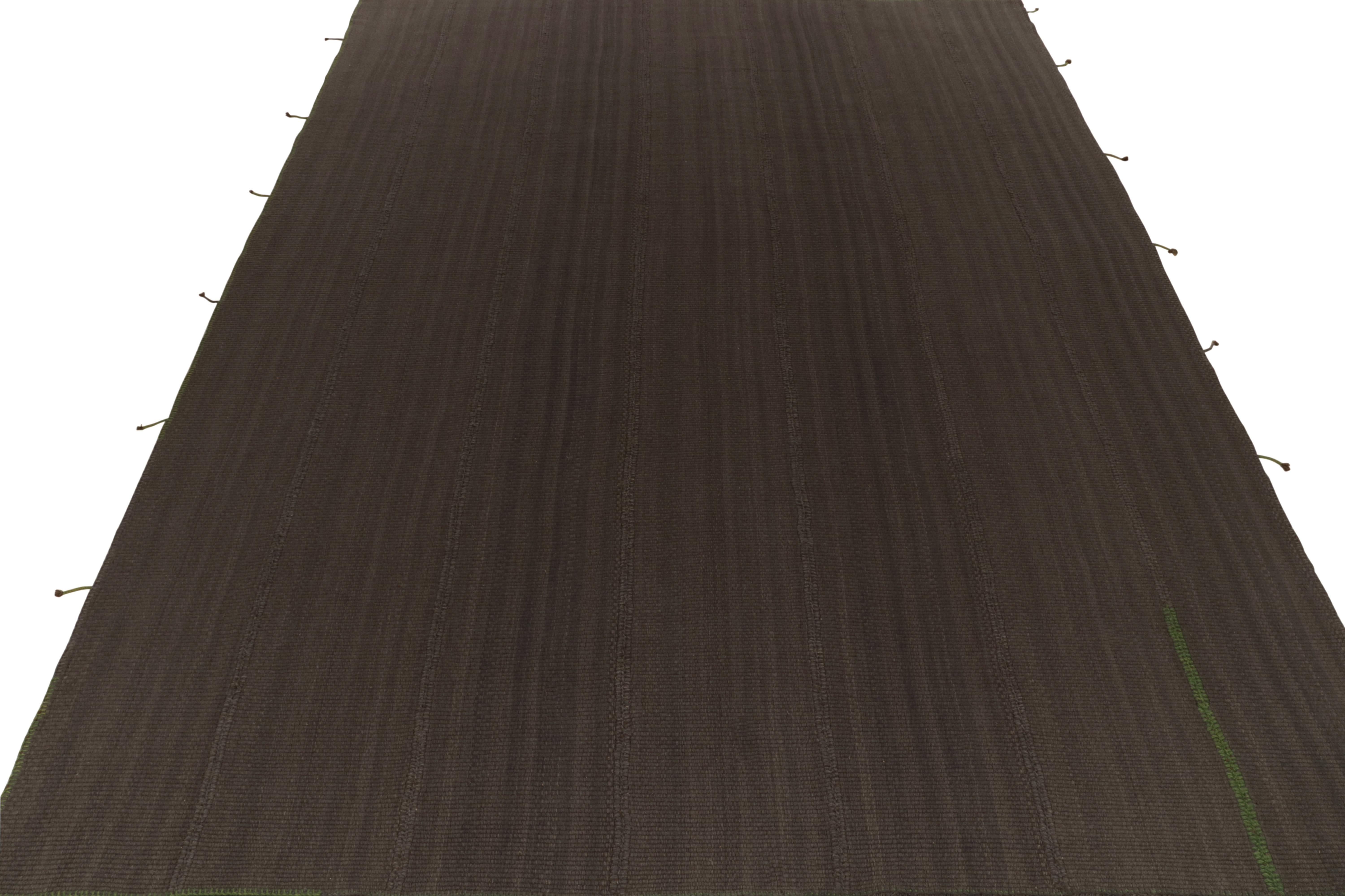 Handwoven in wool, a 12x16 Kilim from an inventive new line of contemporary flatweaves by Rug & Kilim.

On the Design: Fondly dubbed the “Rez” Kilim, the piece enjoys rich brown with blue accents in a reimagining of panel-weaving techniques. Keen