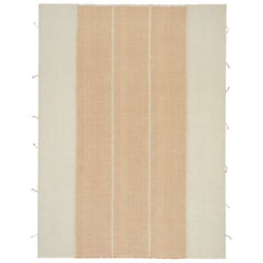 Rug
Kilim è un kilim contemporaneo a strisce color arancio ruggine e bianco crema.