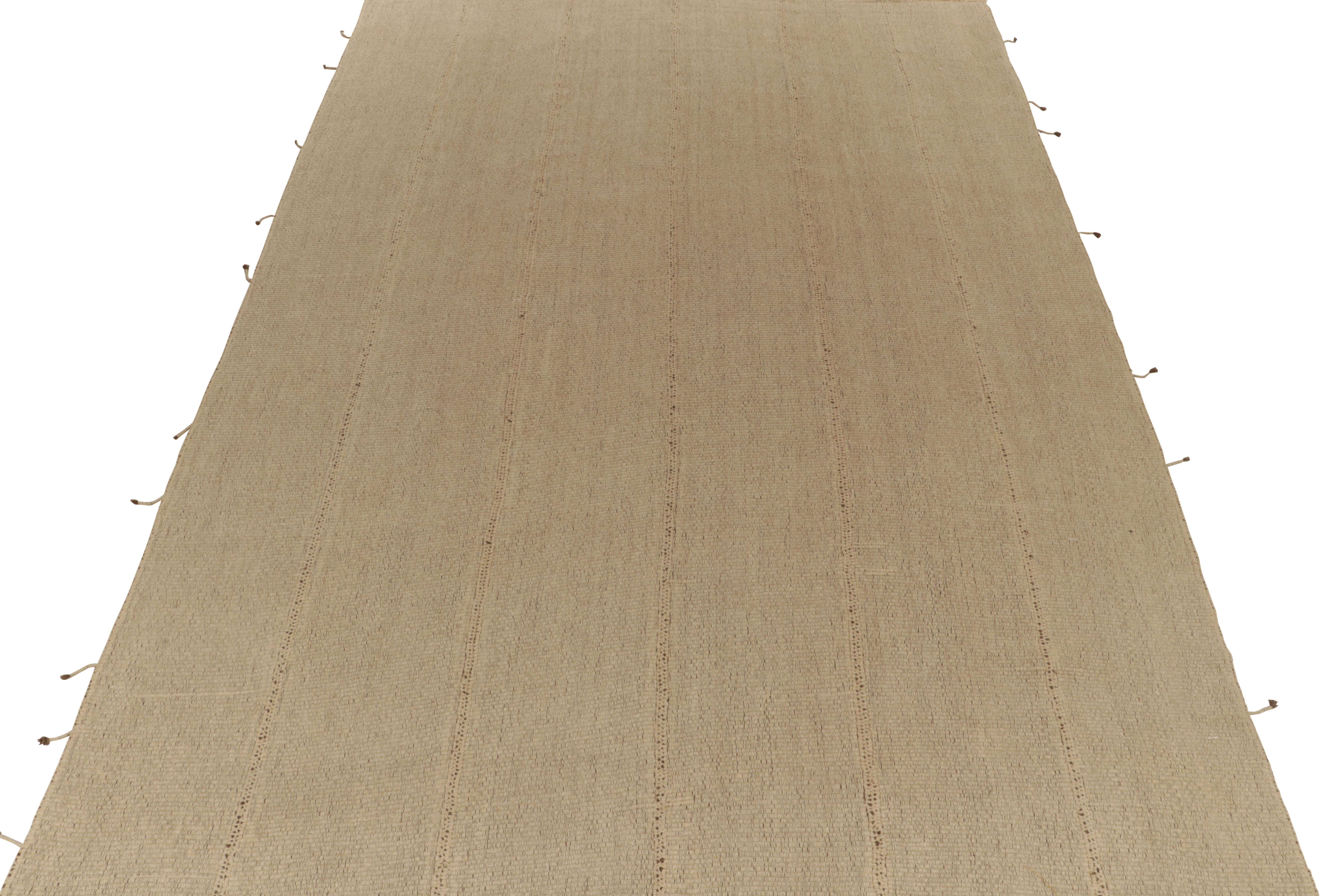 Handwoven in wool, a 10x15 Kilim from a new, prolific line of contemporary flatweaves by Rug & Kilim.

On the Design: Fondly called the “Rez Kilim”line, the piece enjoys a more durable take on classic panel-woven style in sandy beige-brown hues.